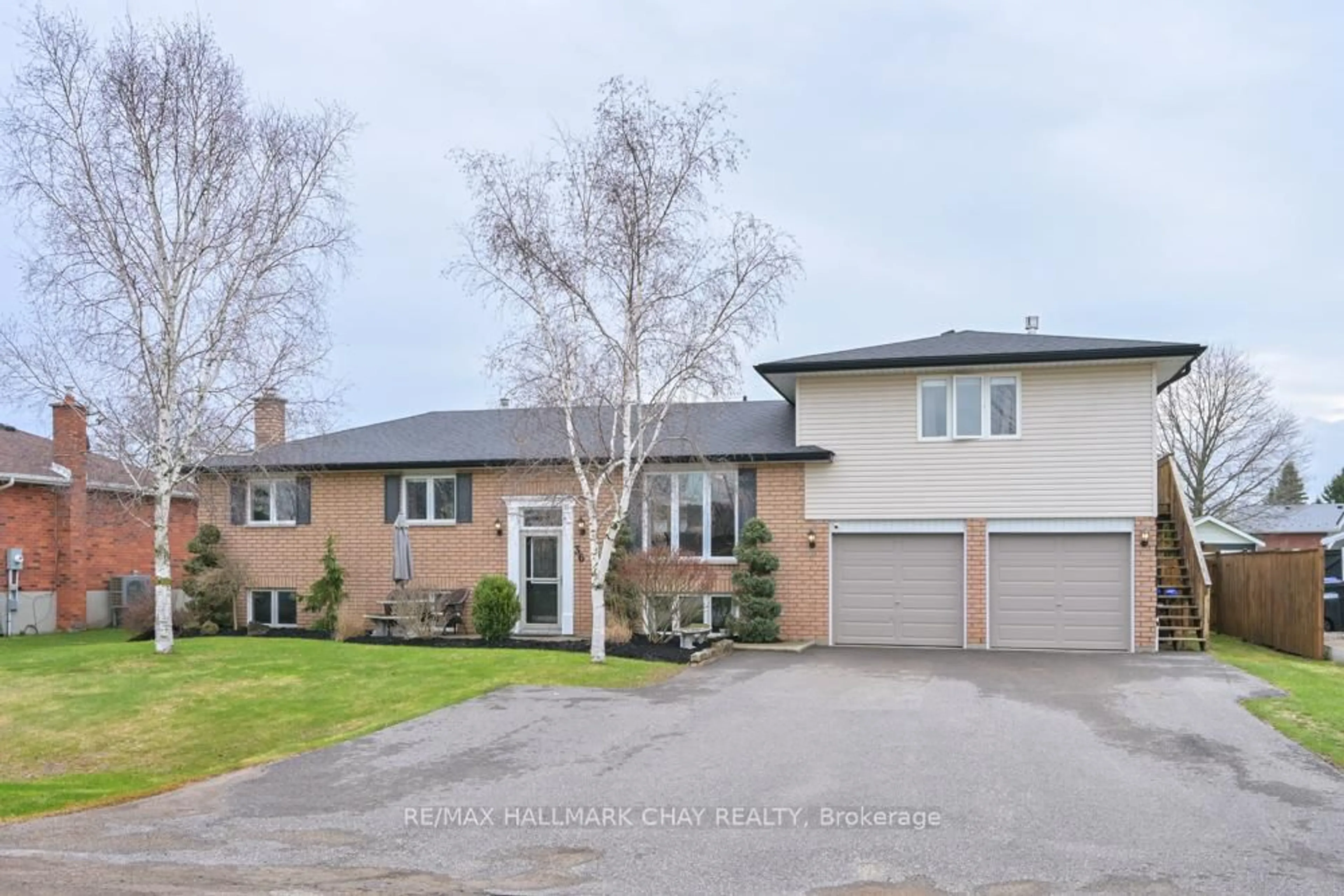 Home with brick exterior material, street for 36 Moore Ave, Adjala-Tosorontio Ontario L0M 1J0