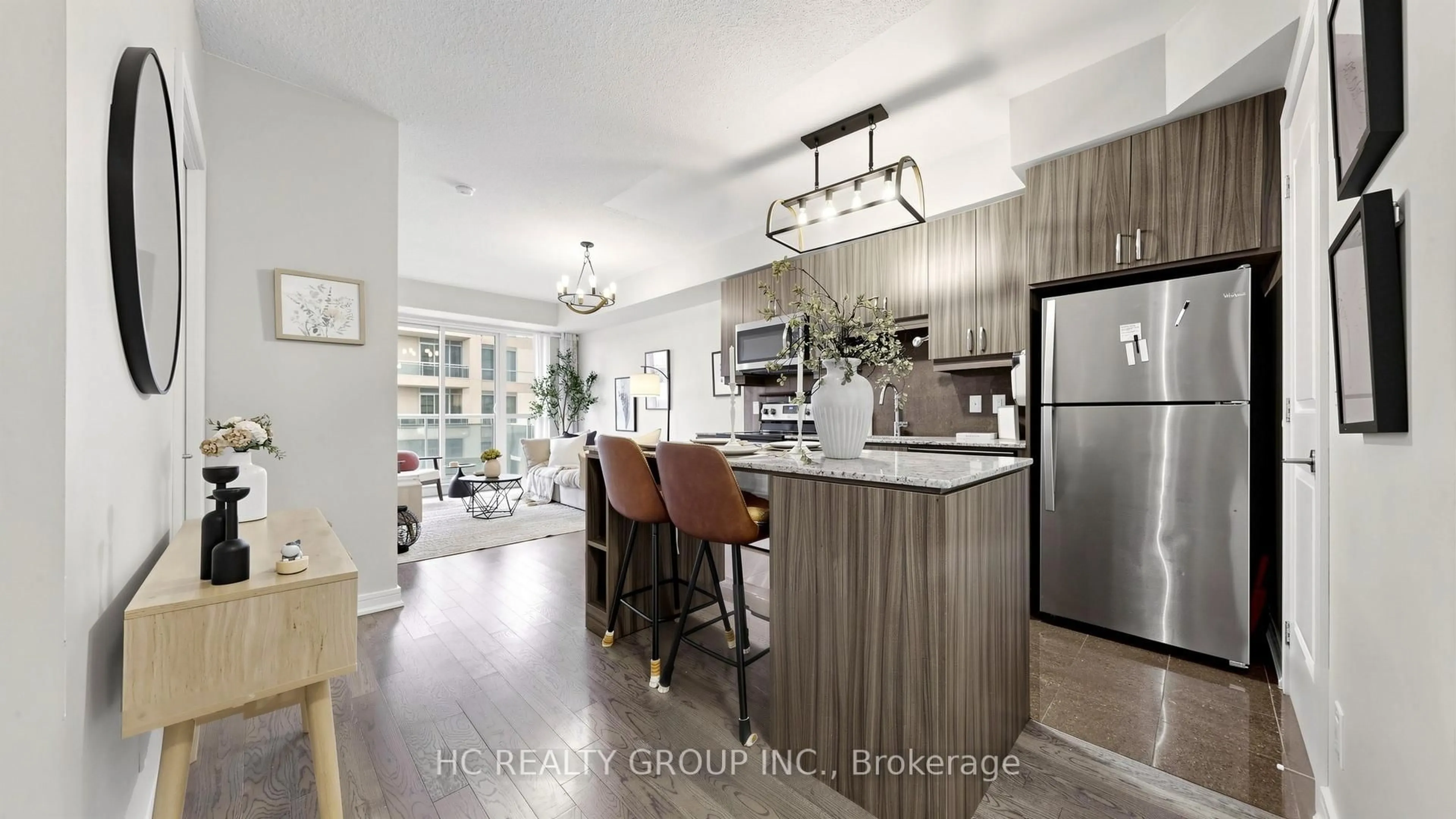 Open concept kitchen, wood/laminate floor for 9205 Yonge St #907, Richmond Hill Ontario L4C 1V5