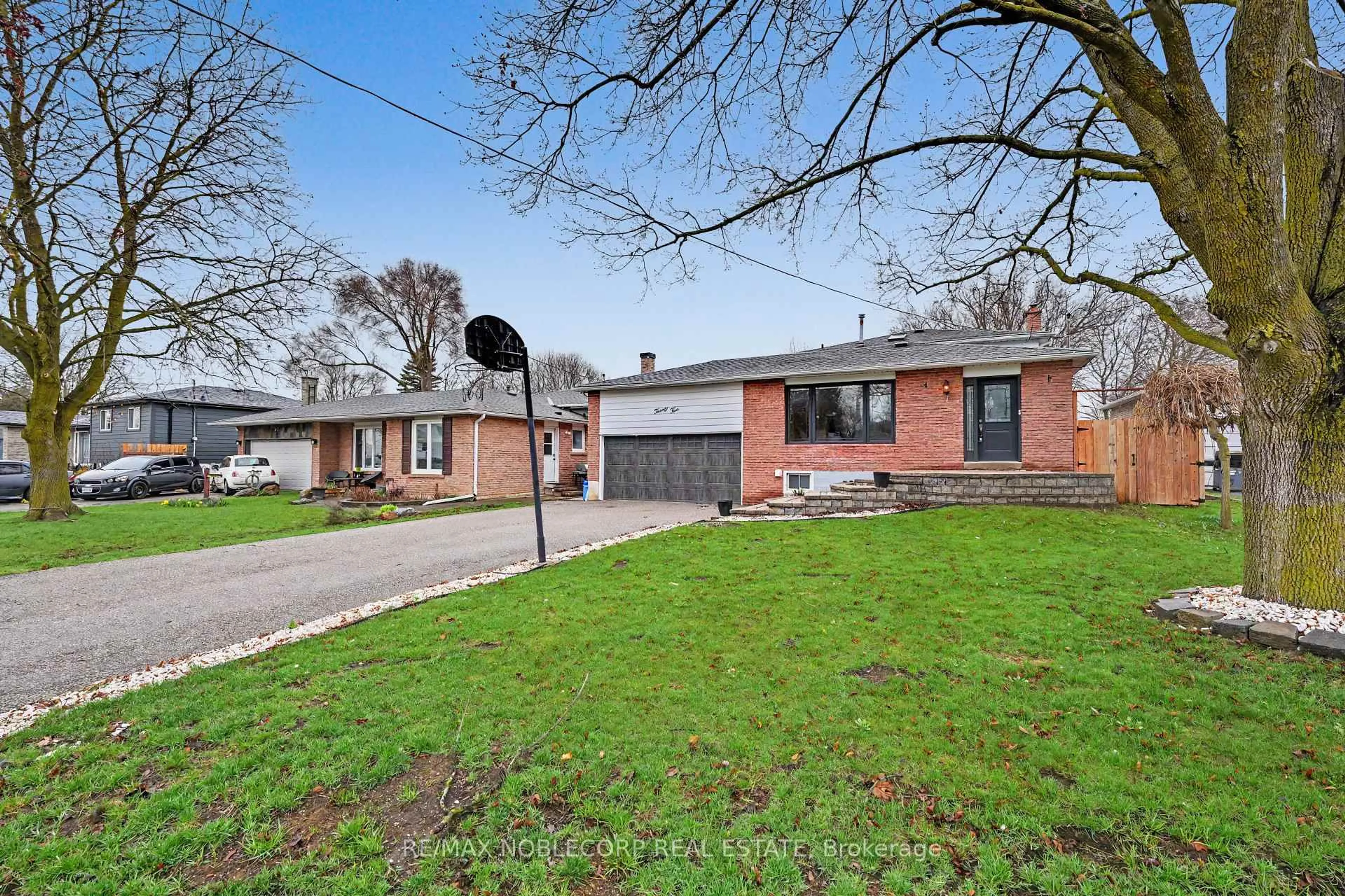 Home with brick exterior material, street for 24 Maple Ave, New Tecumseth Ontario L0G 1A0