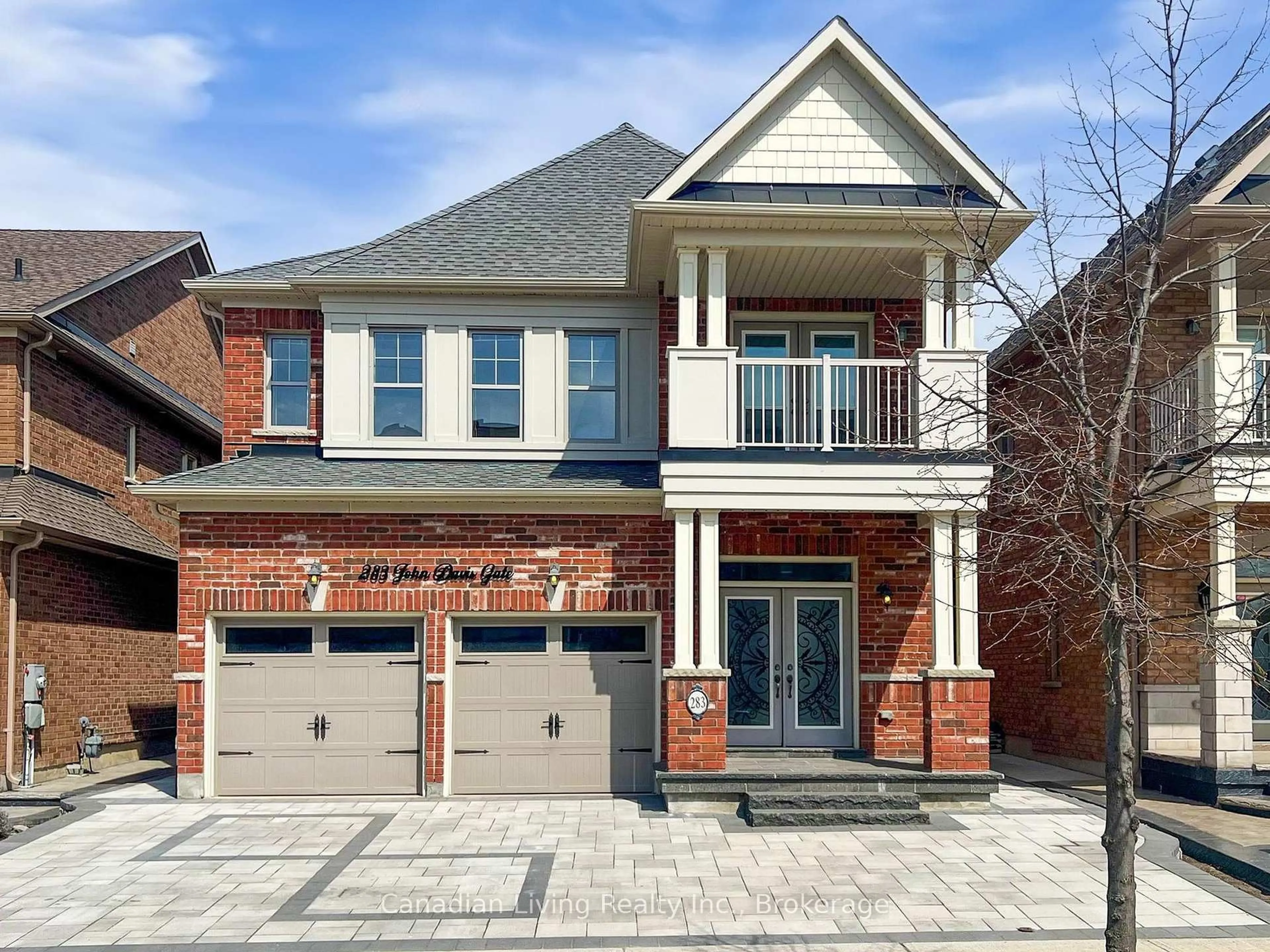 Home with brick exterior material, street for 283 John Davis Gate, Whitchurch-Stouffville Ontario L4A 1T5