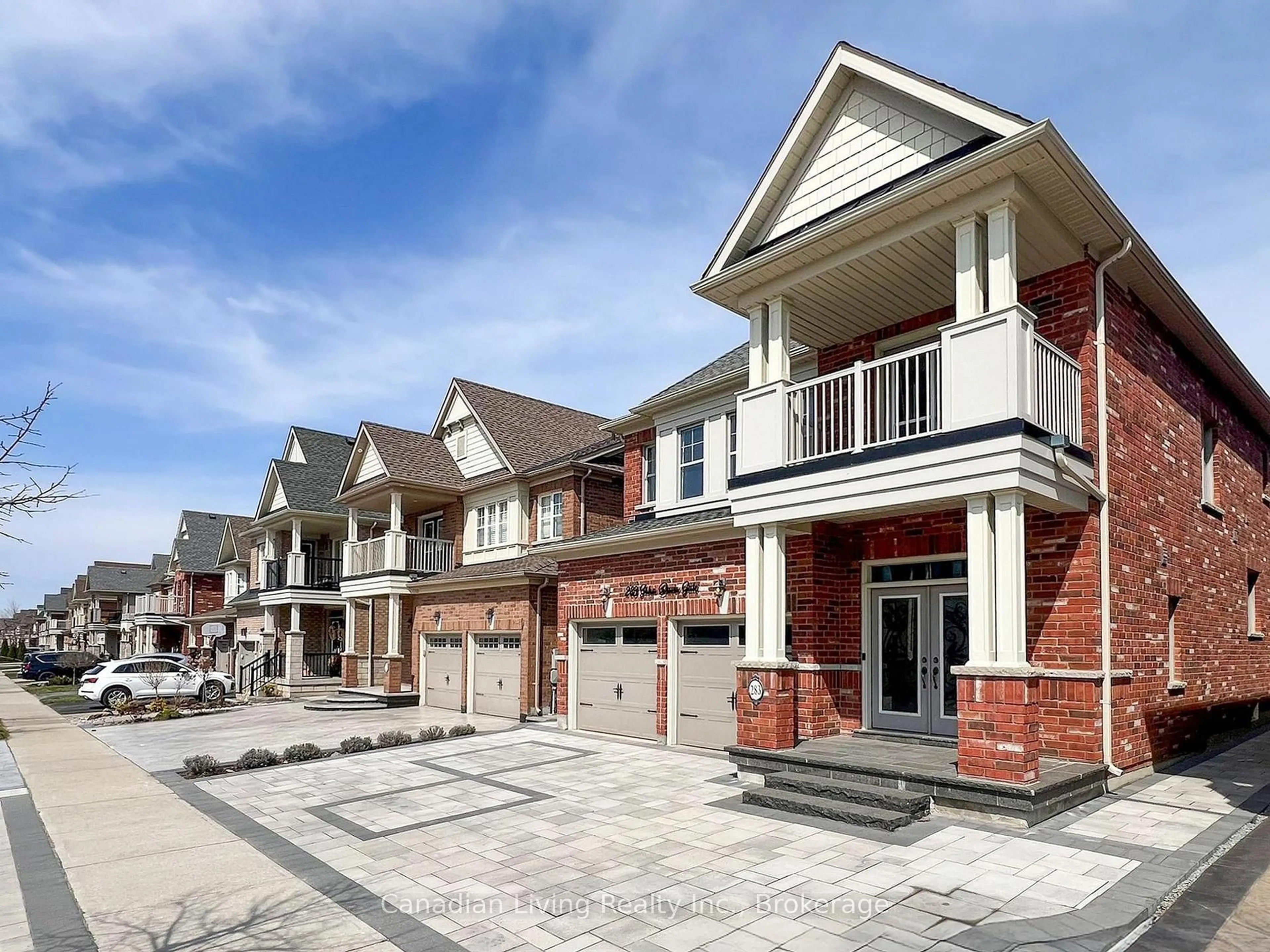 Home with brick exterior material, street for 283 John Davis Gate, Whitchurch-Stouffville Ontario L4A 1T5
