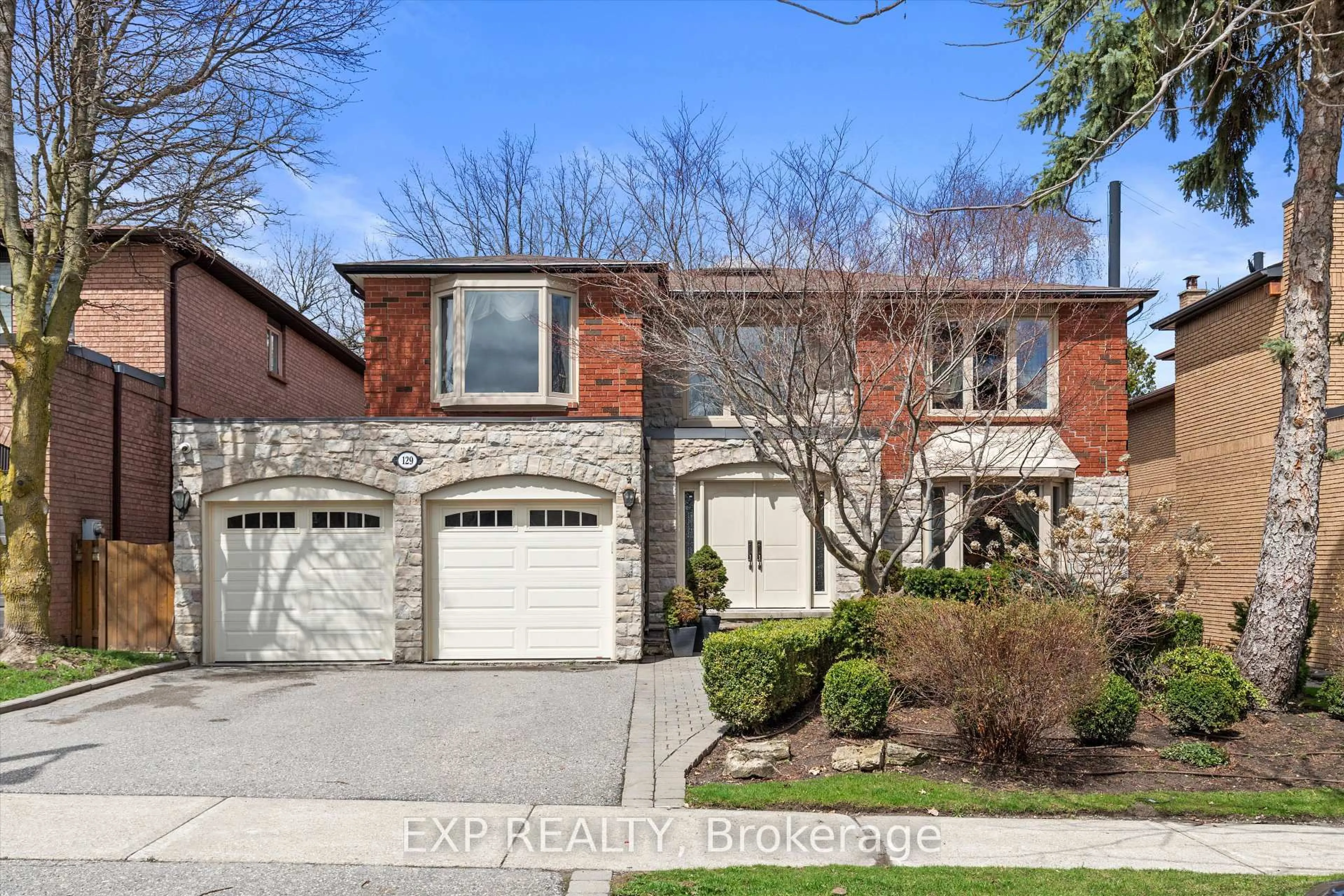 Home with brick exterior material, street for 129 Rose Green Dr, Vaughan Ontario L4J 4R6