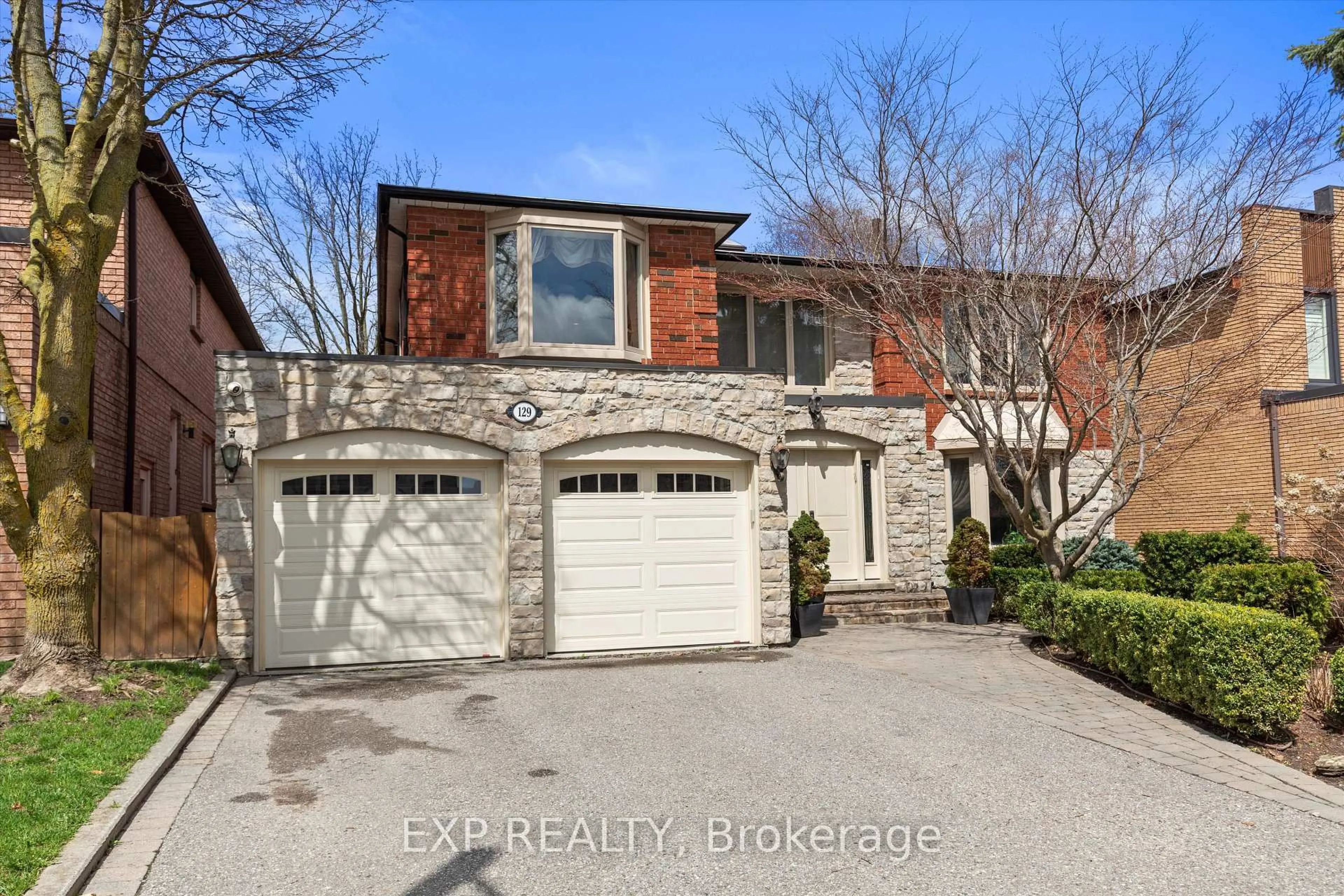 Home with brick exterior material, street for 129 Rose Green Dr, Vaughan Ontario L4J 4R6