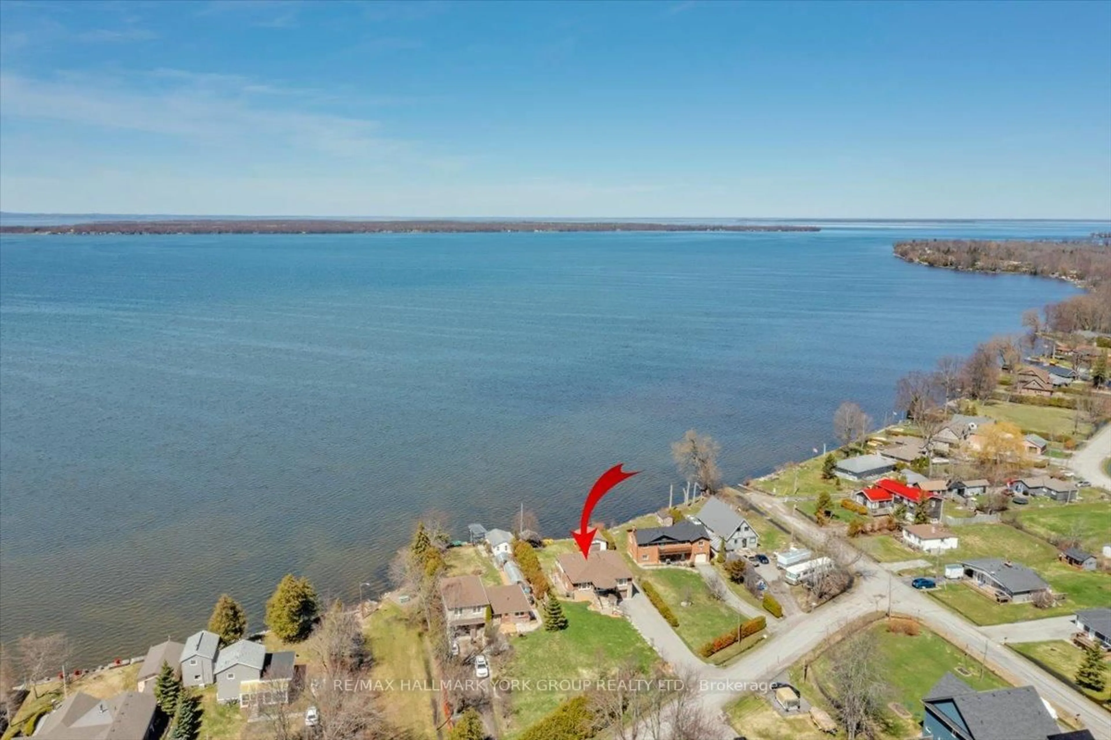 A pic from outside/outdoor area/front of a property/back of a property/a pic from drone, water/lake/river/ocean view for 20 Burnie Rd, Georgina Ontario L0E 1N0