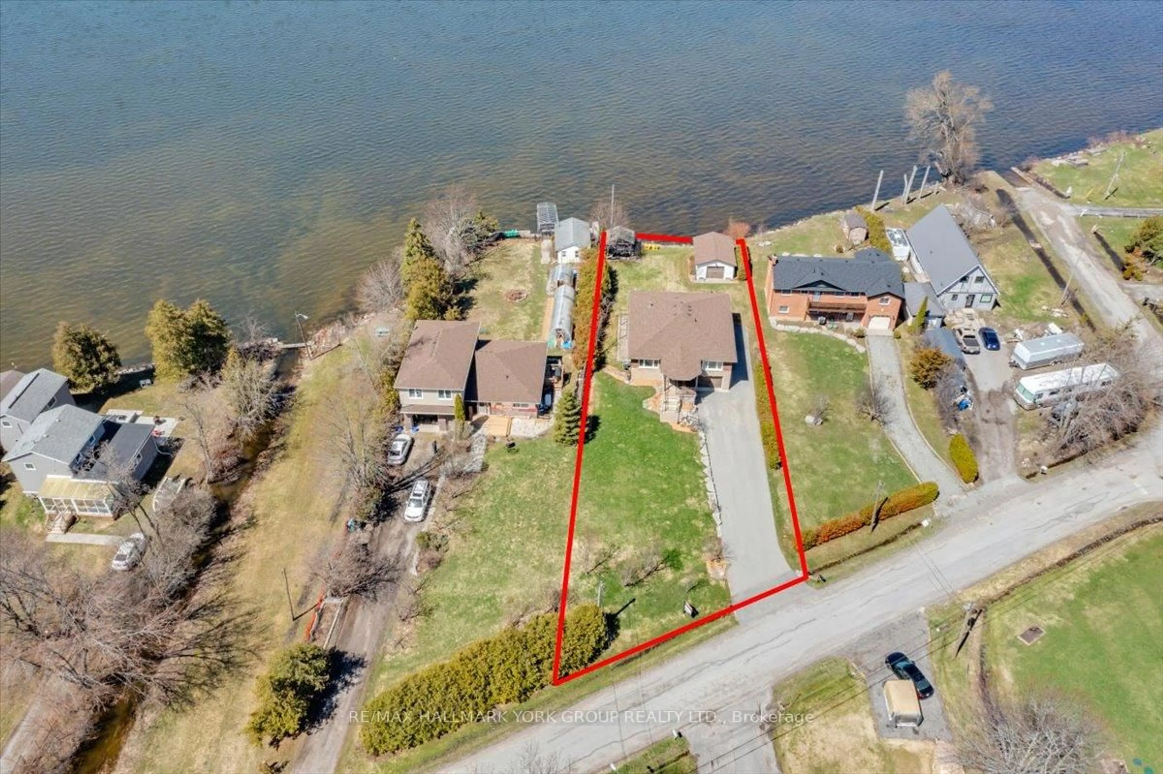 A pic from outside/outdoor area/front of a property/back of a property/a pic from drone, water/lake/river/ocean view for 20 Burnie Rd, Georgina Ontario L0E 1N0