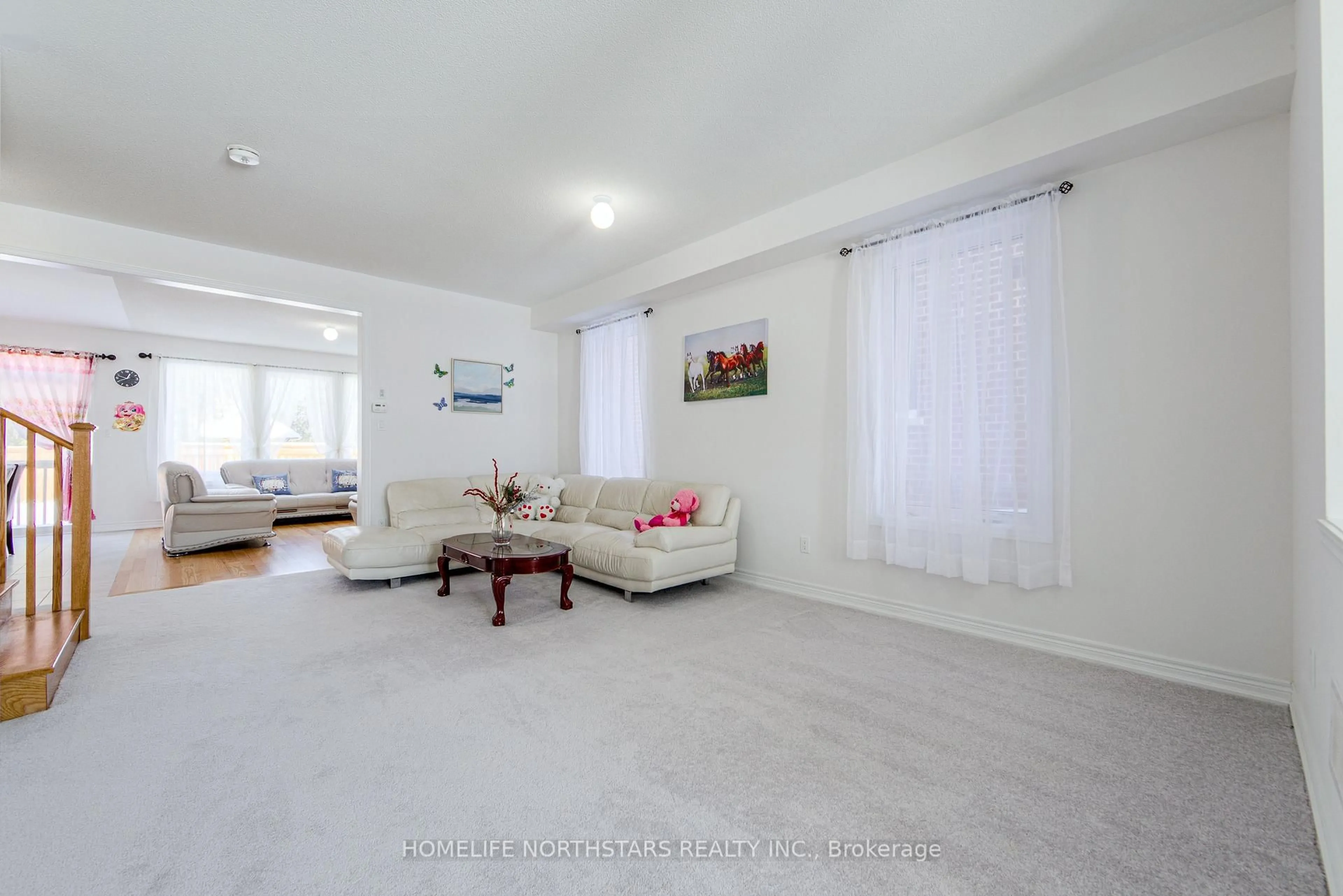 Living room with furniture, unknown for 7 Wakefield Blvd, Essa Ontario L3W 0L7
