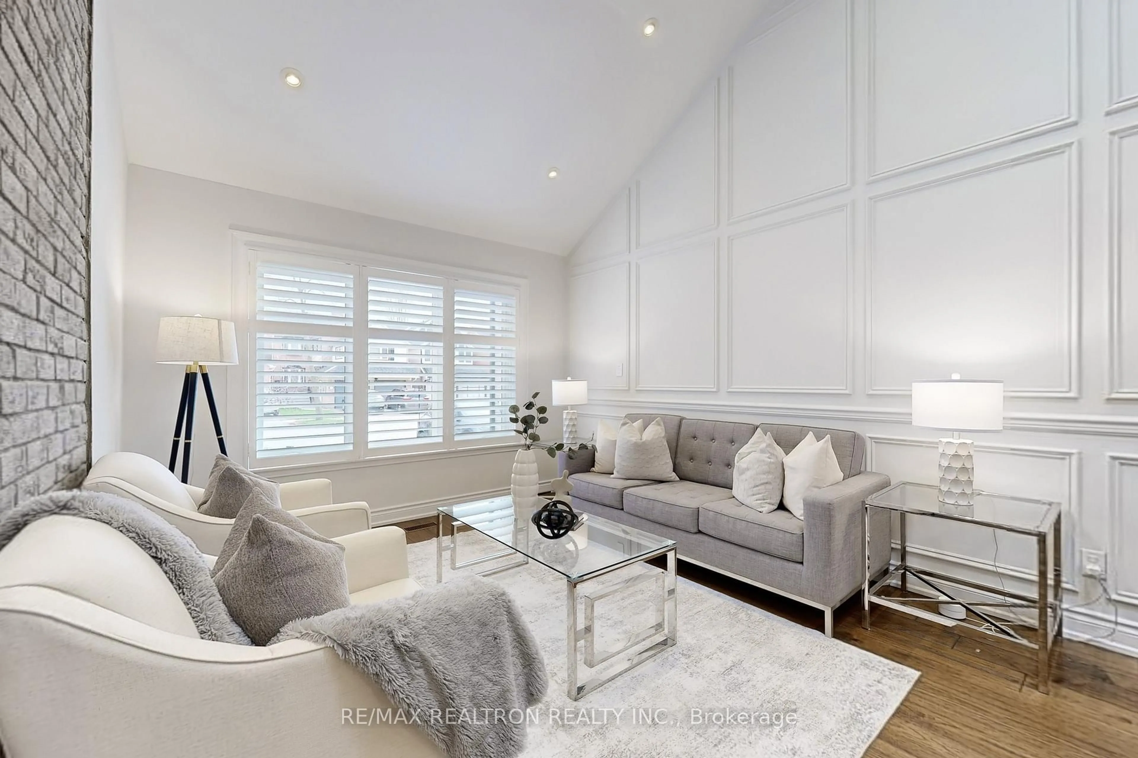 Living room with furniture, wood/laminate floor for 147 Mcmorran Cres, Vaughan Ontario L4J 2T4