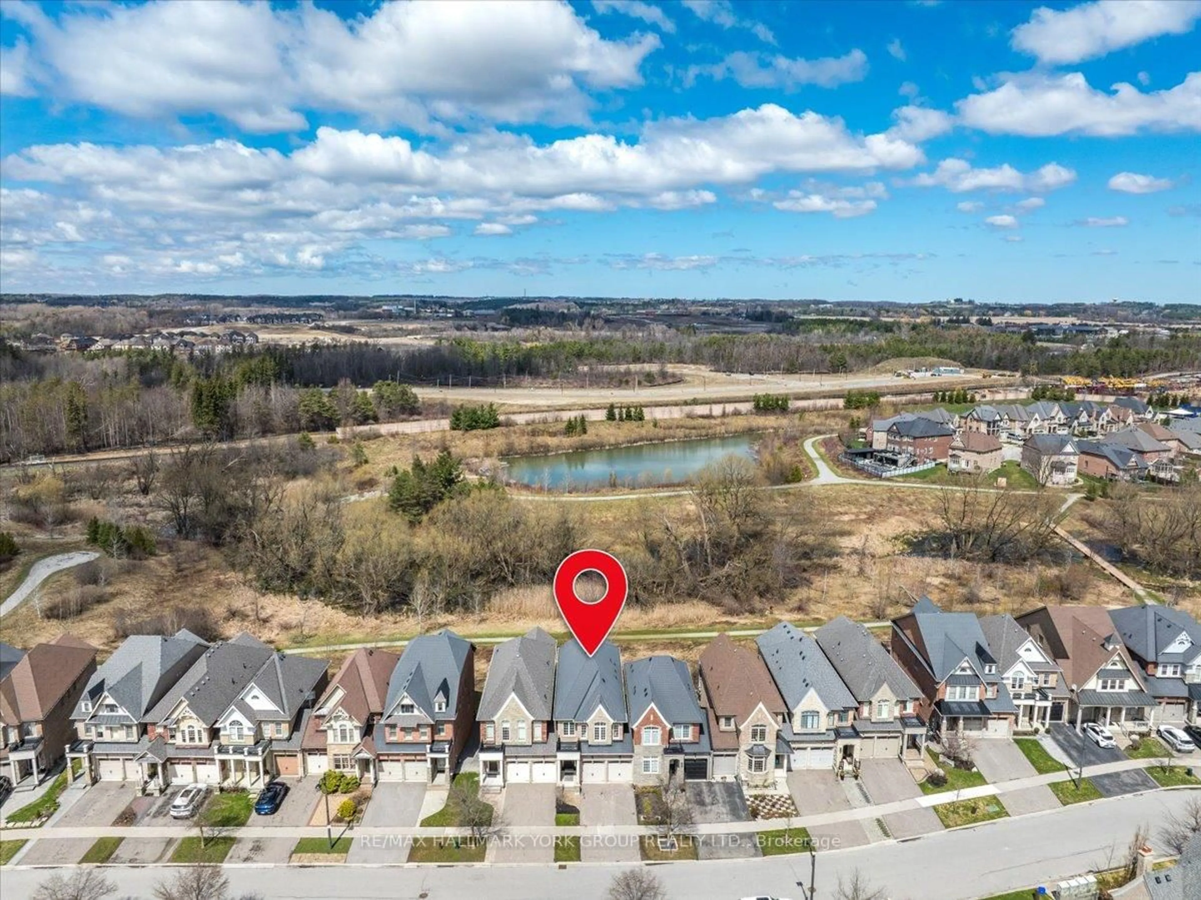 A pic from outside/outdoor area/front of a property/back of a property/a pic from drone, water/lake/river/ocean view for 40 Alex Campbell Cres, King Ontario L7B 0C2