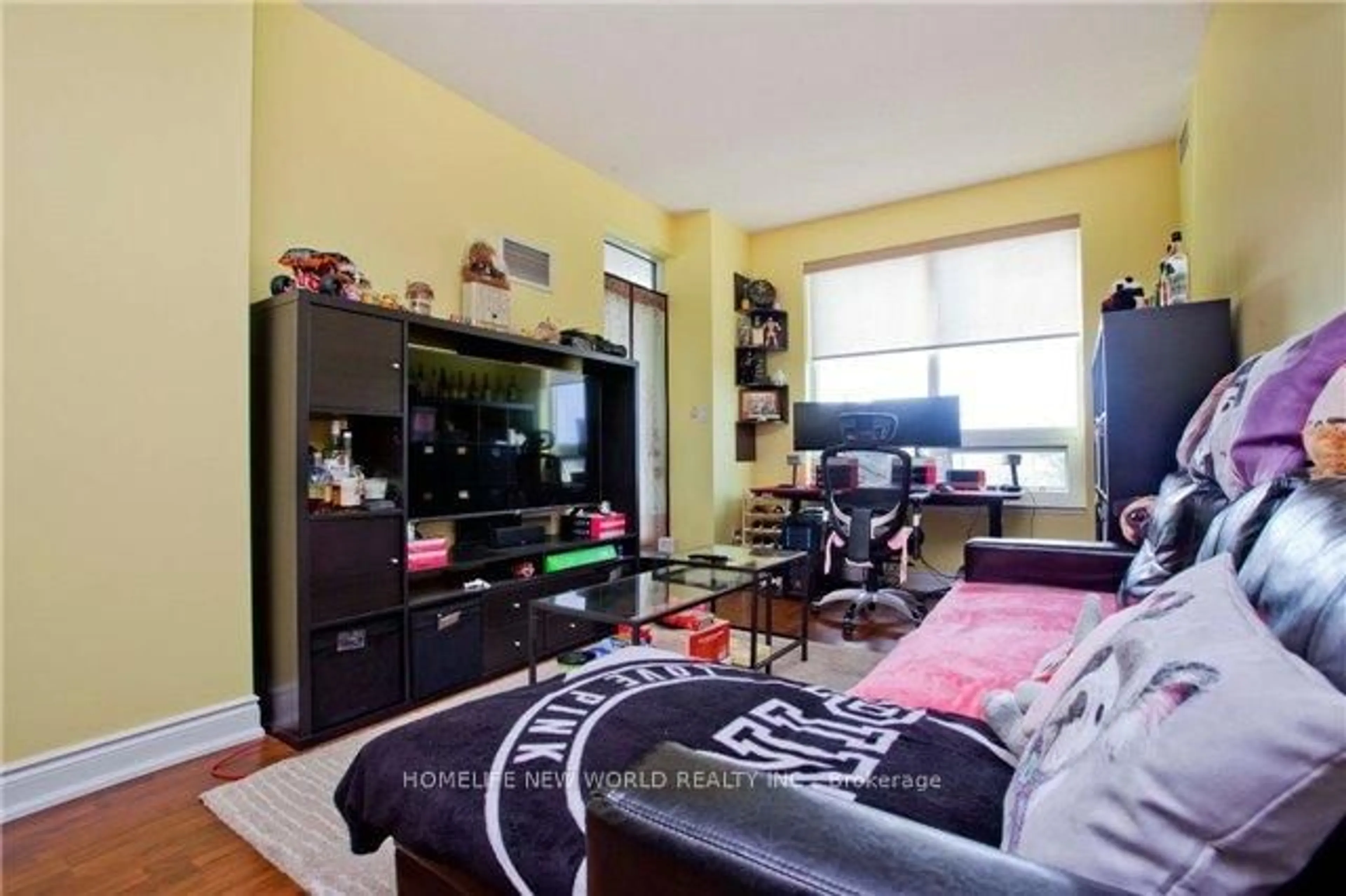 Living room with furniture, wood/laminate floor for 50 Clegg Rd #209, Markham Ontario L6G 0C6