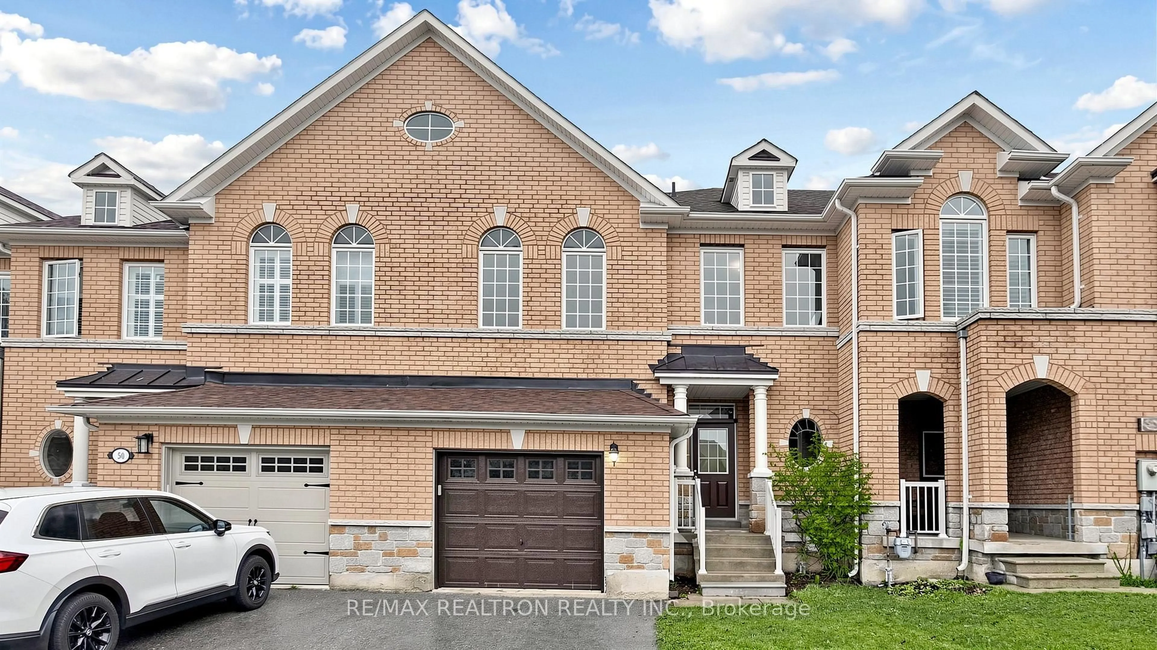 Home with brick exterior material, street for 52 Gauguin Ave, Vaughan Ontario L4J 9J7
