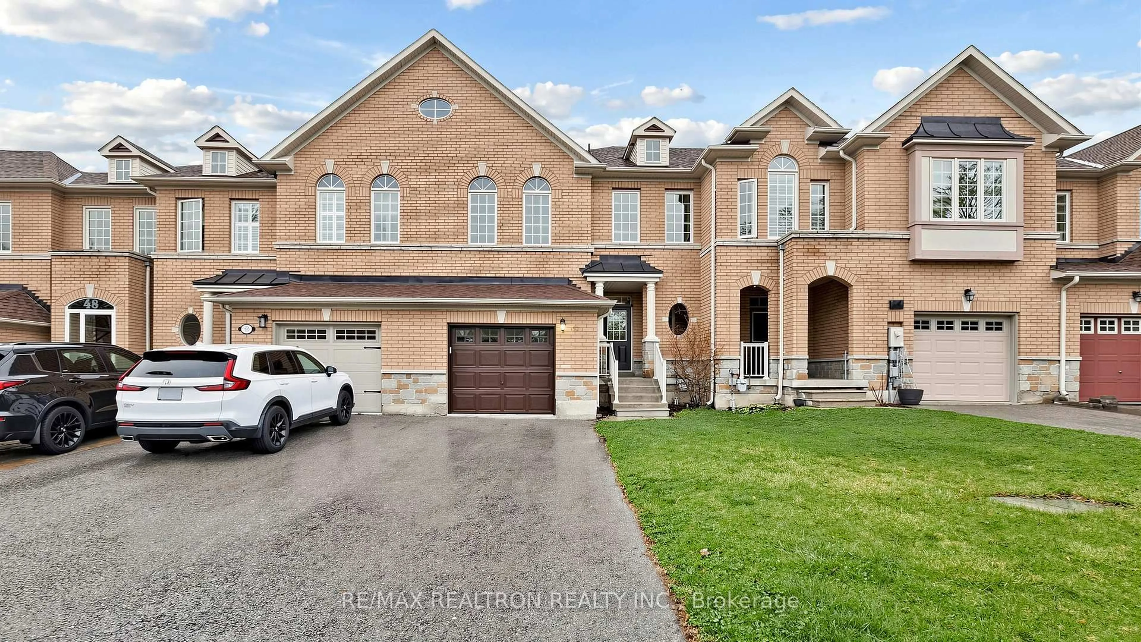 Home with brick exterior material, street for 52 Gauguin Ave, Vaughan Ontario L4J 9J7
