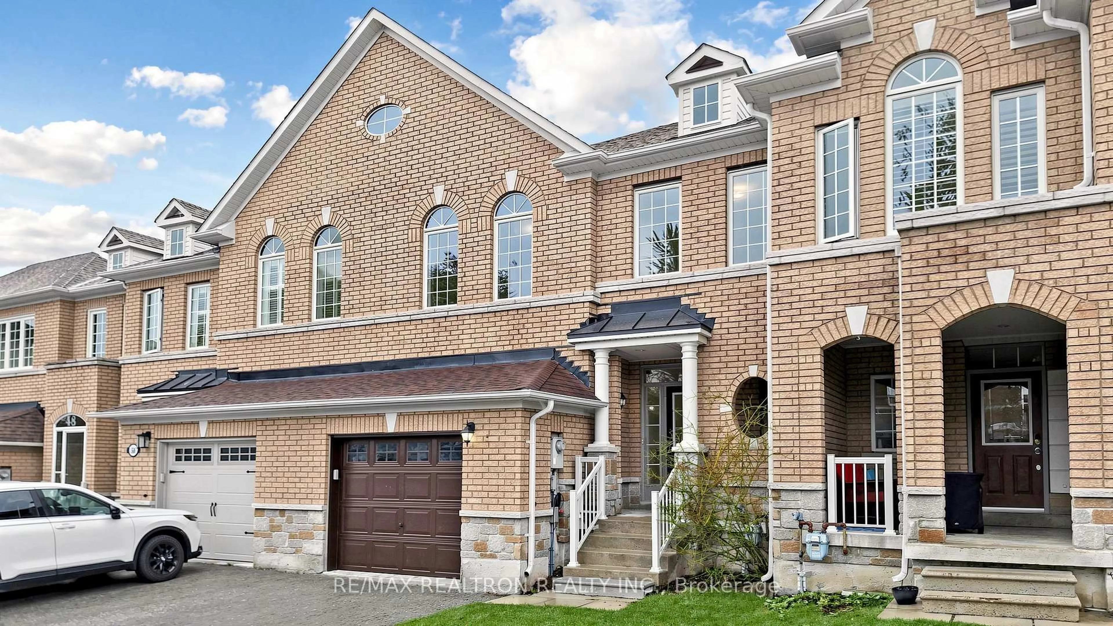 Home with brick exterior material, street for 52 Gauguin Ave, Vaughan Ontario L4J 9J7