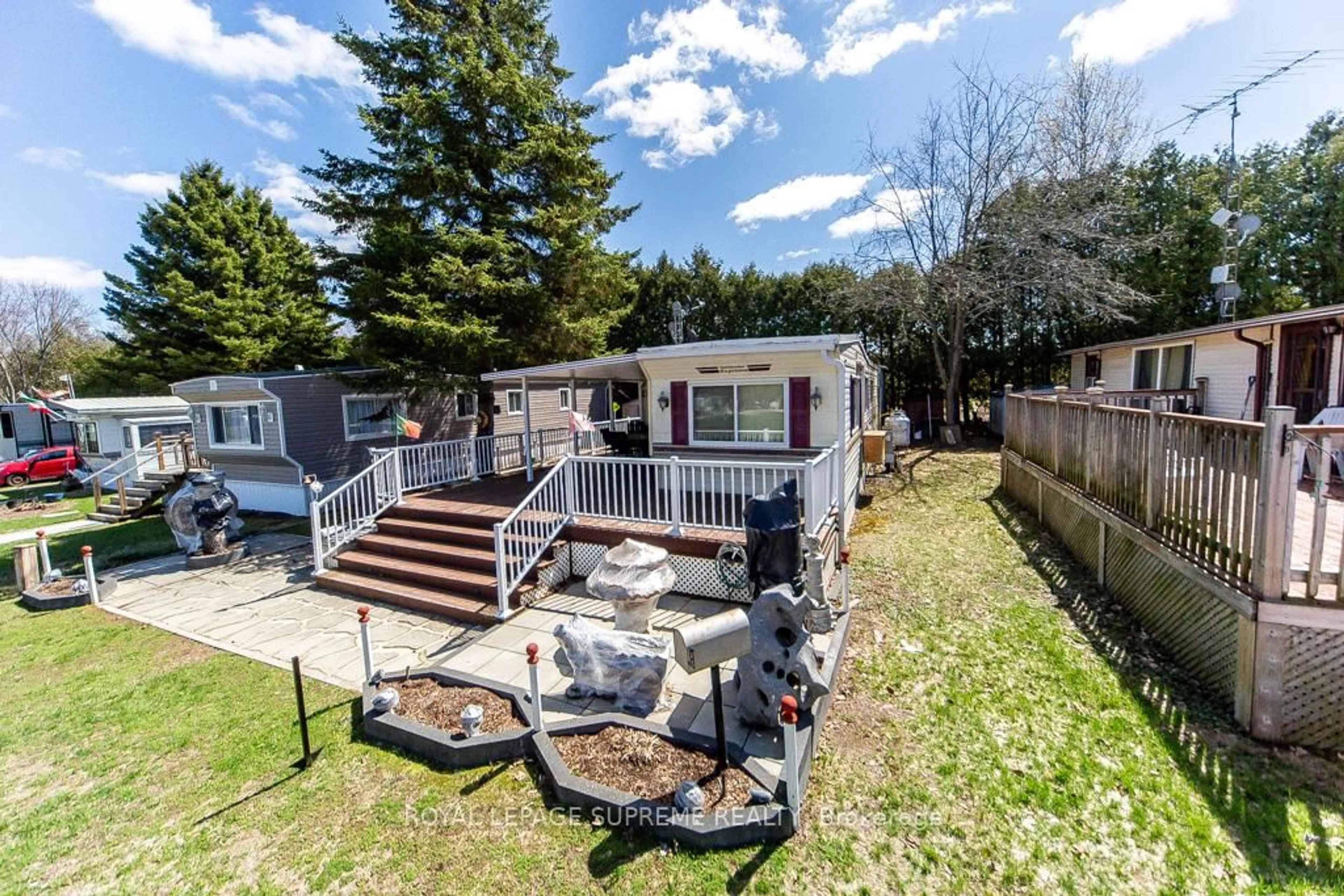 A pic from outside/outdoor area/front of a property/back of a property/a pic from drone, water/lake/river/ocean view for 285 Crydermans Rd #333, Georgina Ontario L0E 1A0