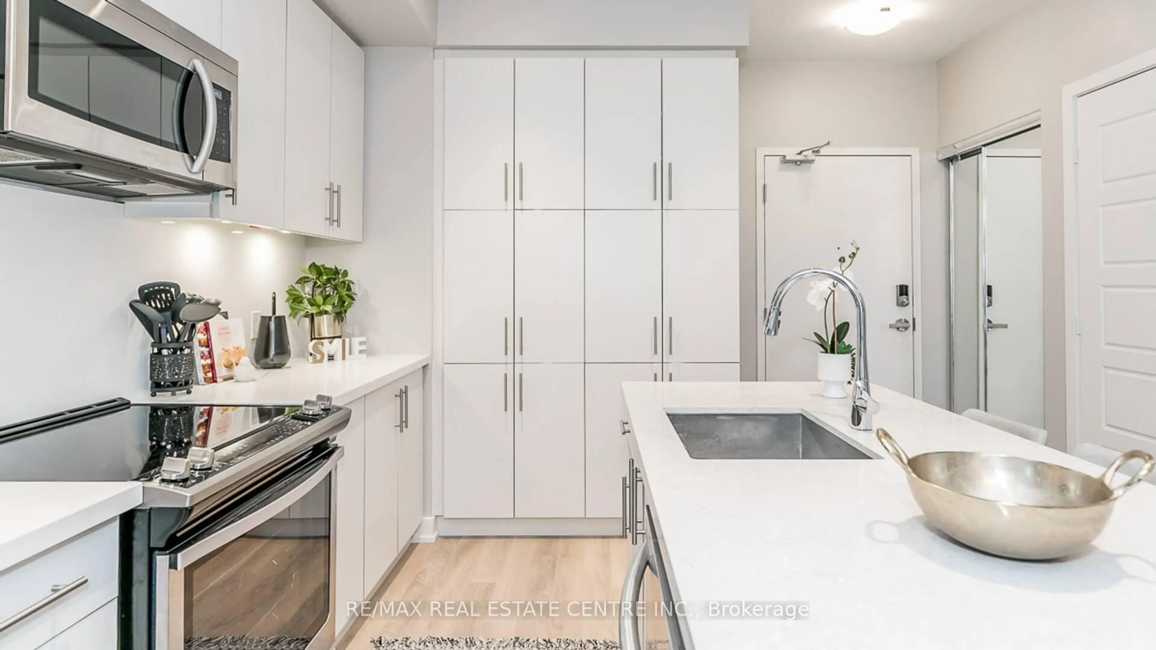 Contemporary kitchen, ceramic/tile floor for 375 Sea Ray Ave #106, Innisfil Ontario L9S 0N9