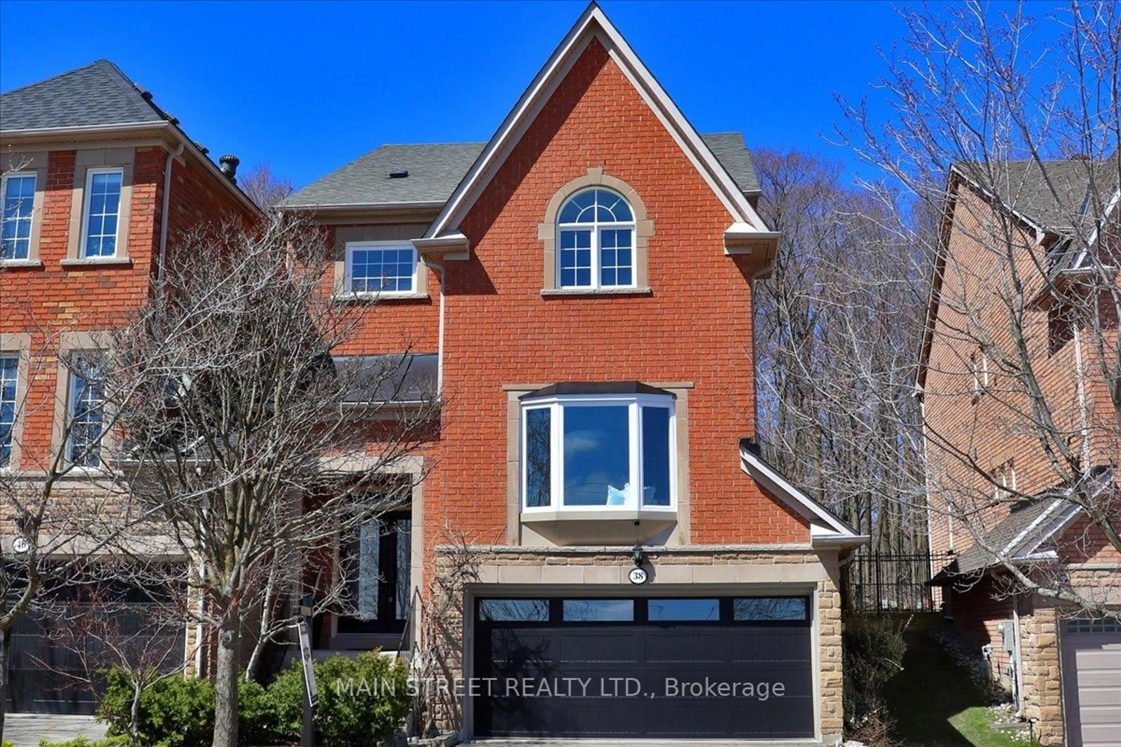 Home with brick exterior material, street for 38 Carriage House Crt, Richmond Hill Ontario L4E 4V3
