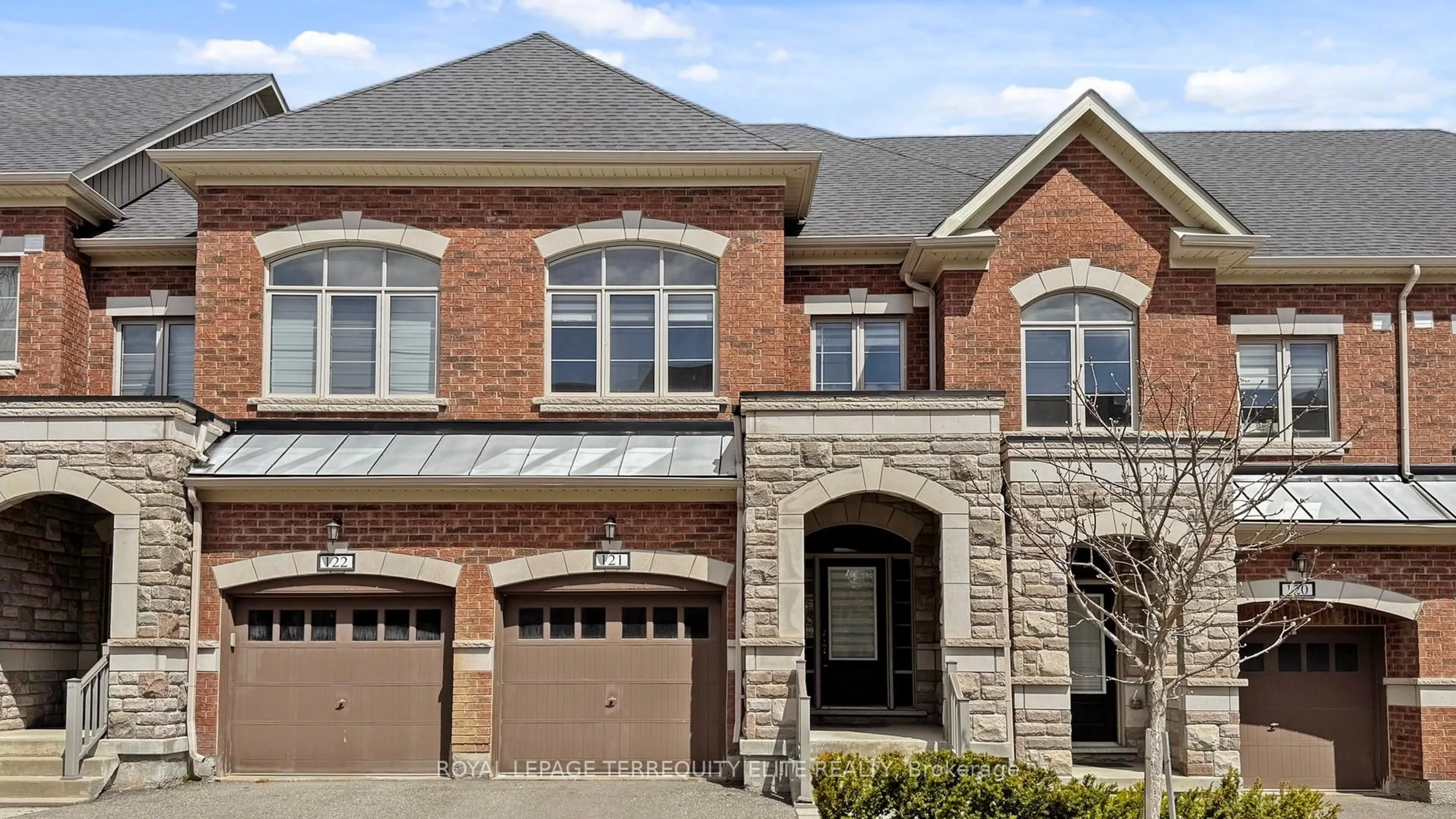 Home with brick exterior material, street for 1331 Major Mackenzie Dr #121, Vaughan Ontario L6A 3Z1