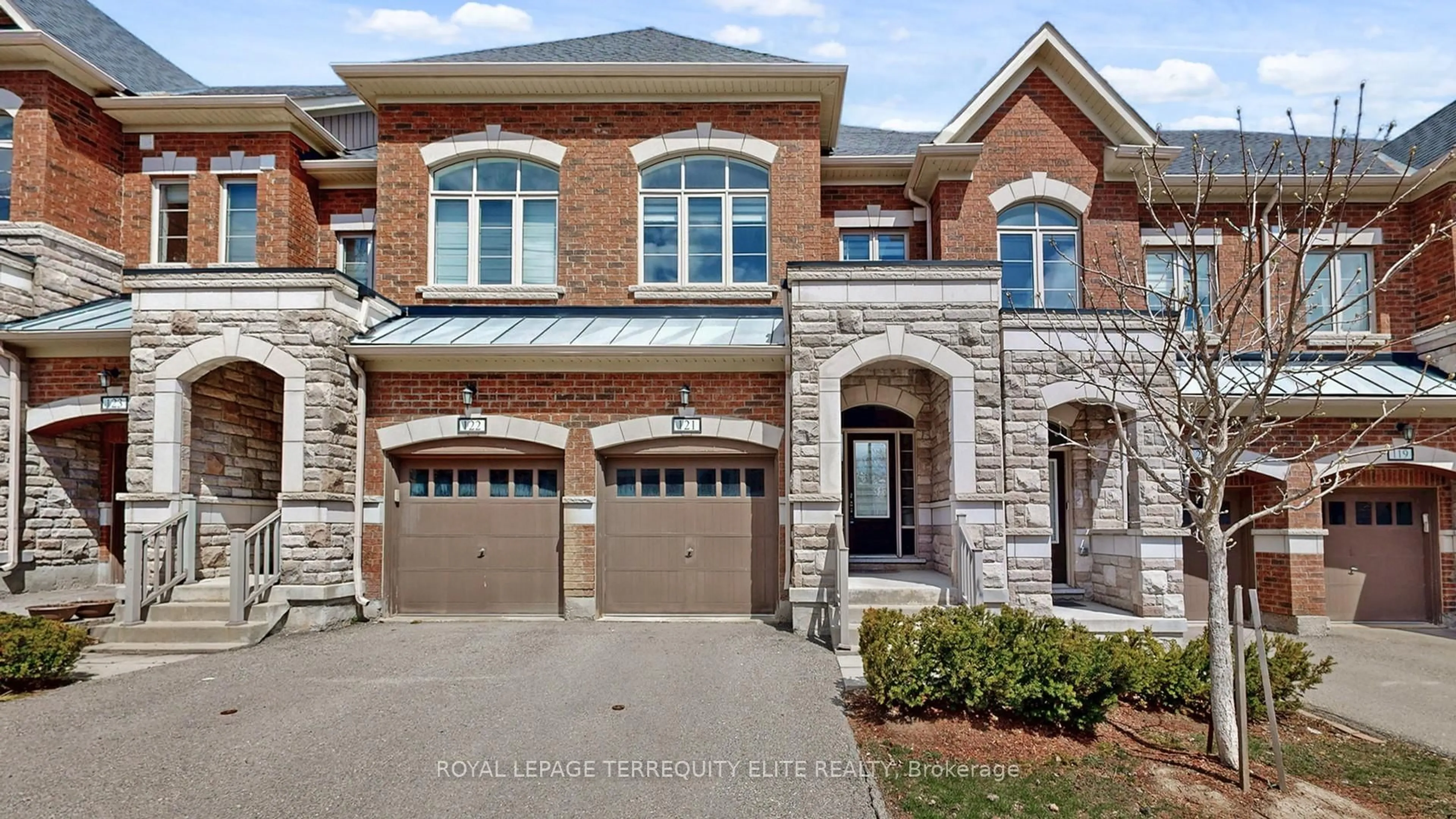 Home with brick exterior material, street for 1331 Major Mackenzie Dr #121, Vaughan Ontario L6A 3Z1