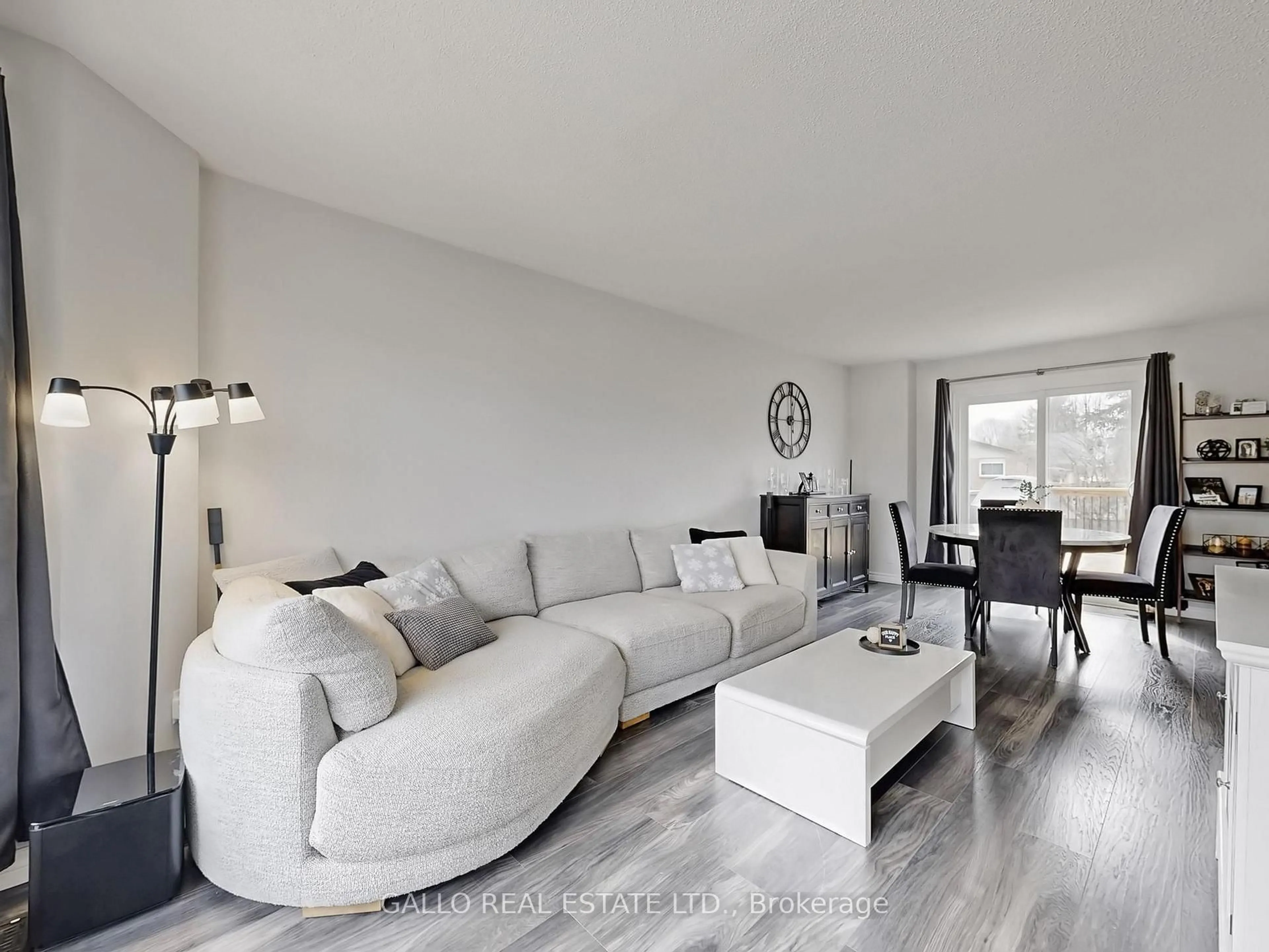 Living room with furniture, wood/laminate floor for 630 Highland Cres, Brock Ontario L0K 1A0