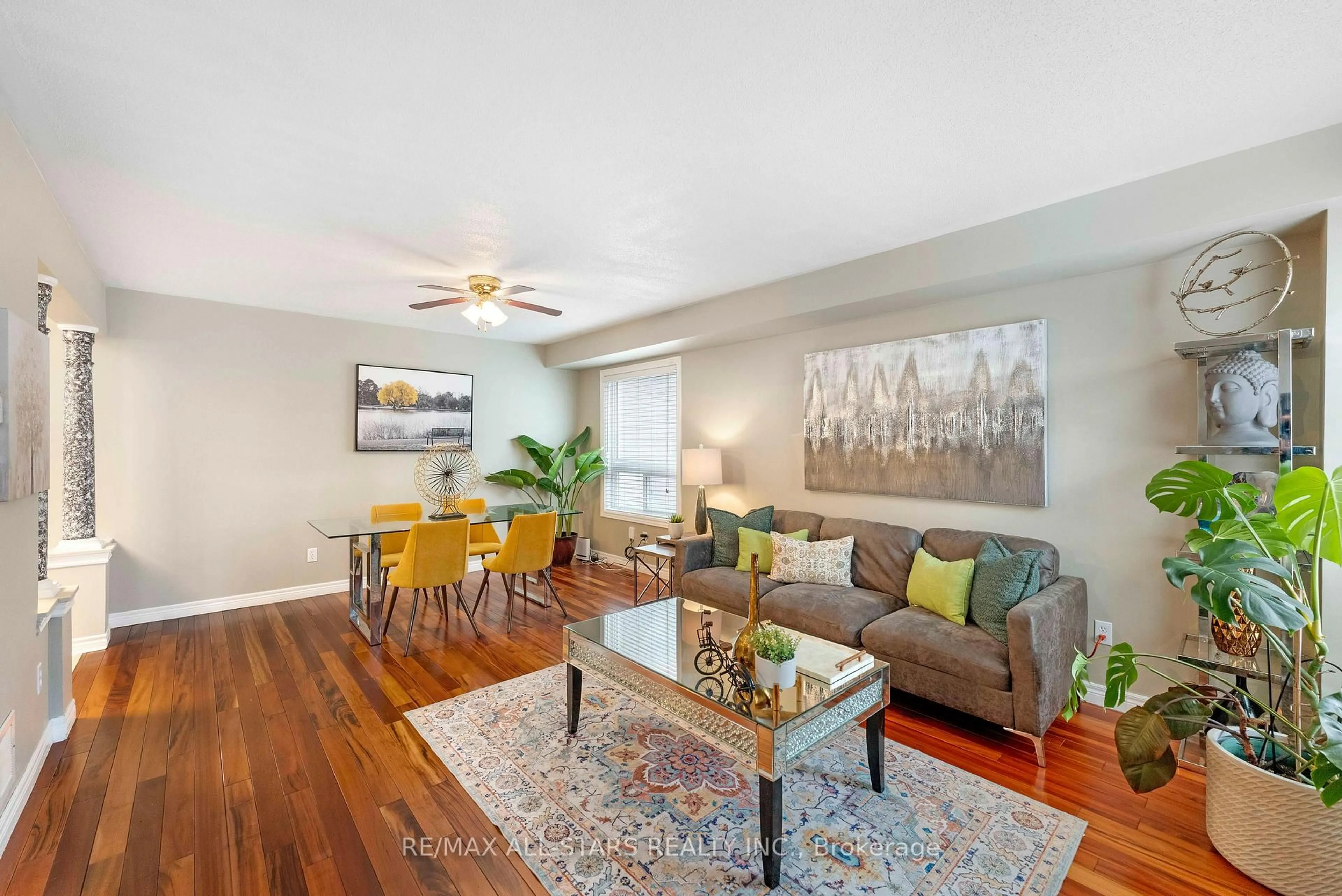 Living room with furniture, wood/laminate floor for 18 Reddenhurst Cres, Georgina Ontario L4P 4G1