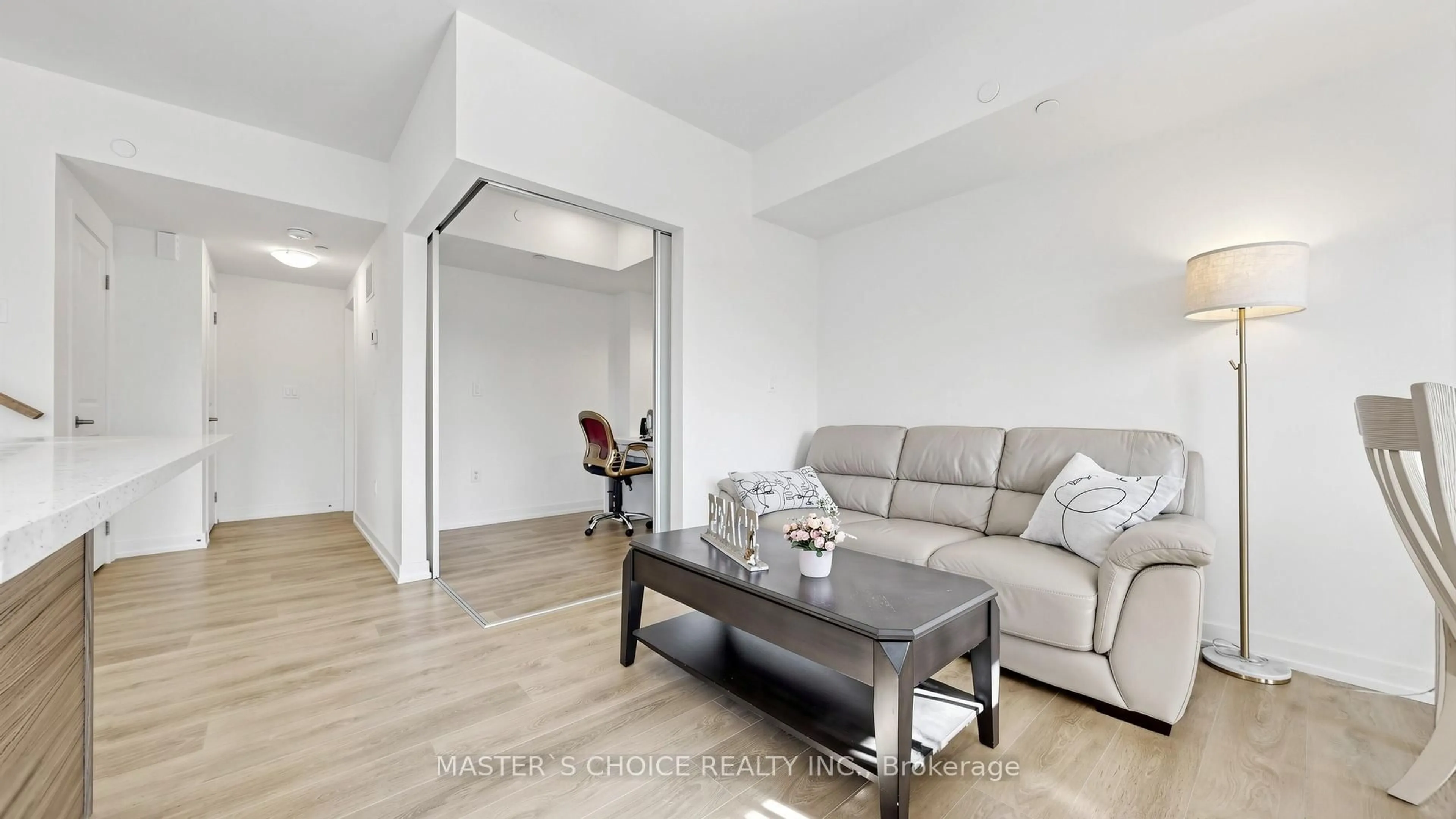 Living room with furniture, wood/laminate floor for 56 Elizabeth St #1404, Richmond Hill Ontario L4C 5W2