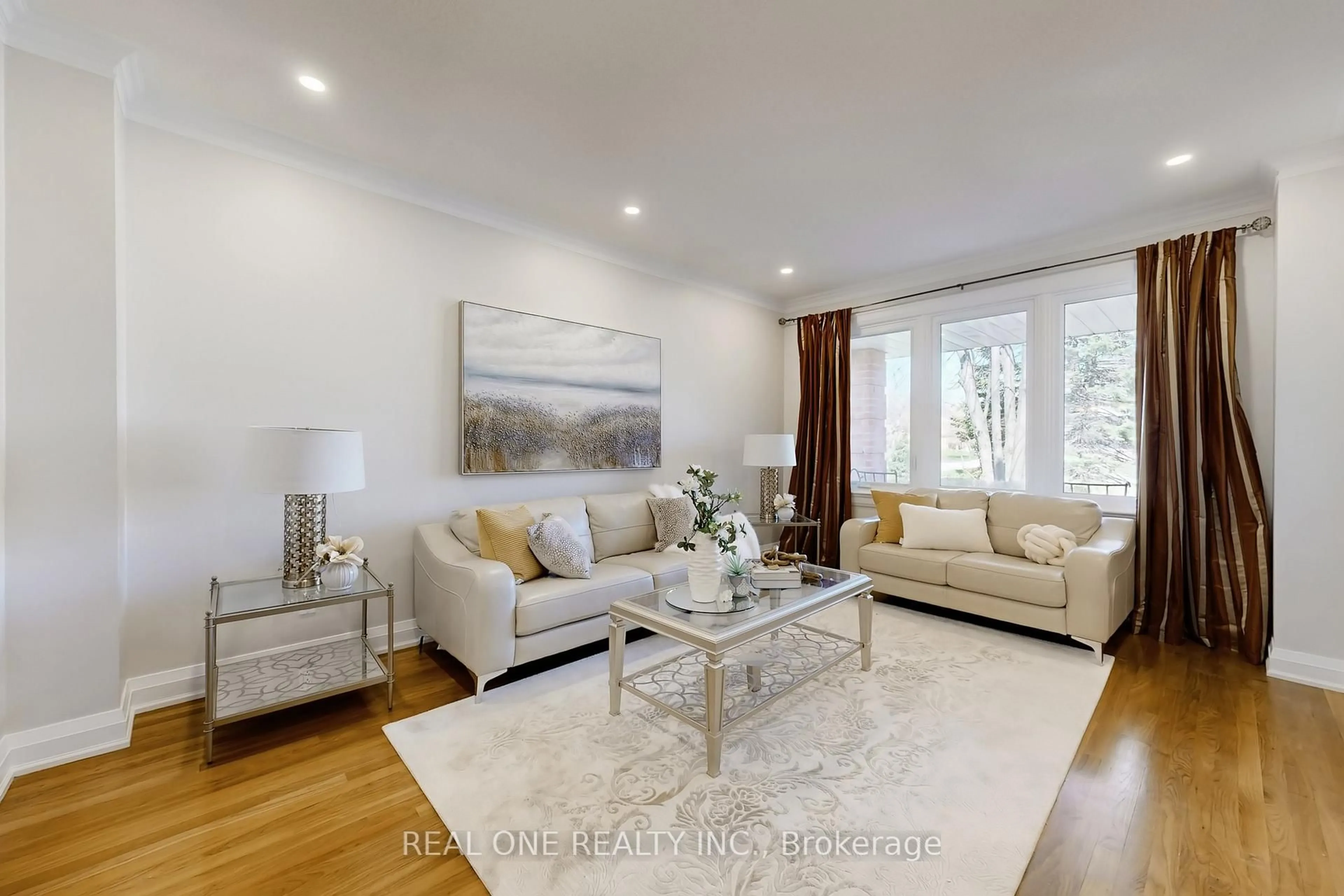 Living room with furniture, wood/laminate floor for 113 Longwater Chse, Markham Ontario L3R 4A9