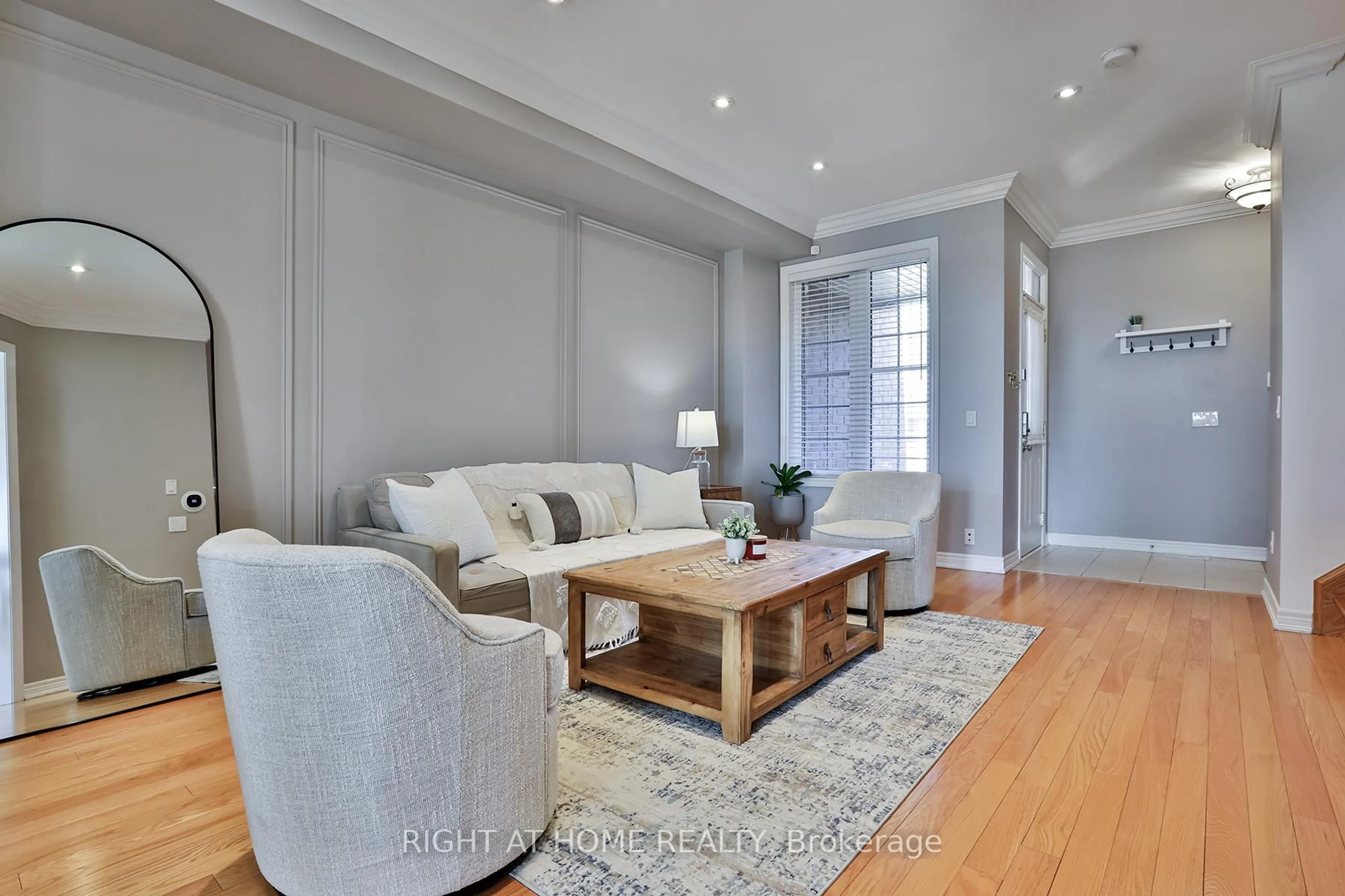 Living room with furniture, wood/laminate floor for 10681 Woodbine Ave, Markham Ontario L6C 0H4