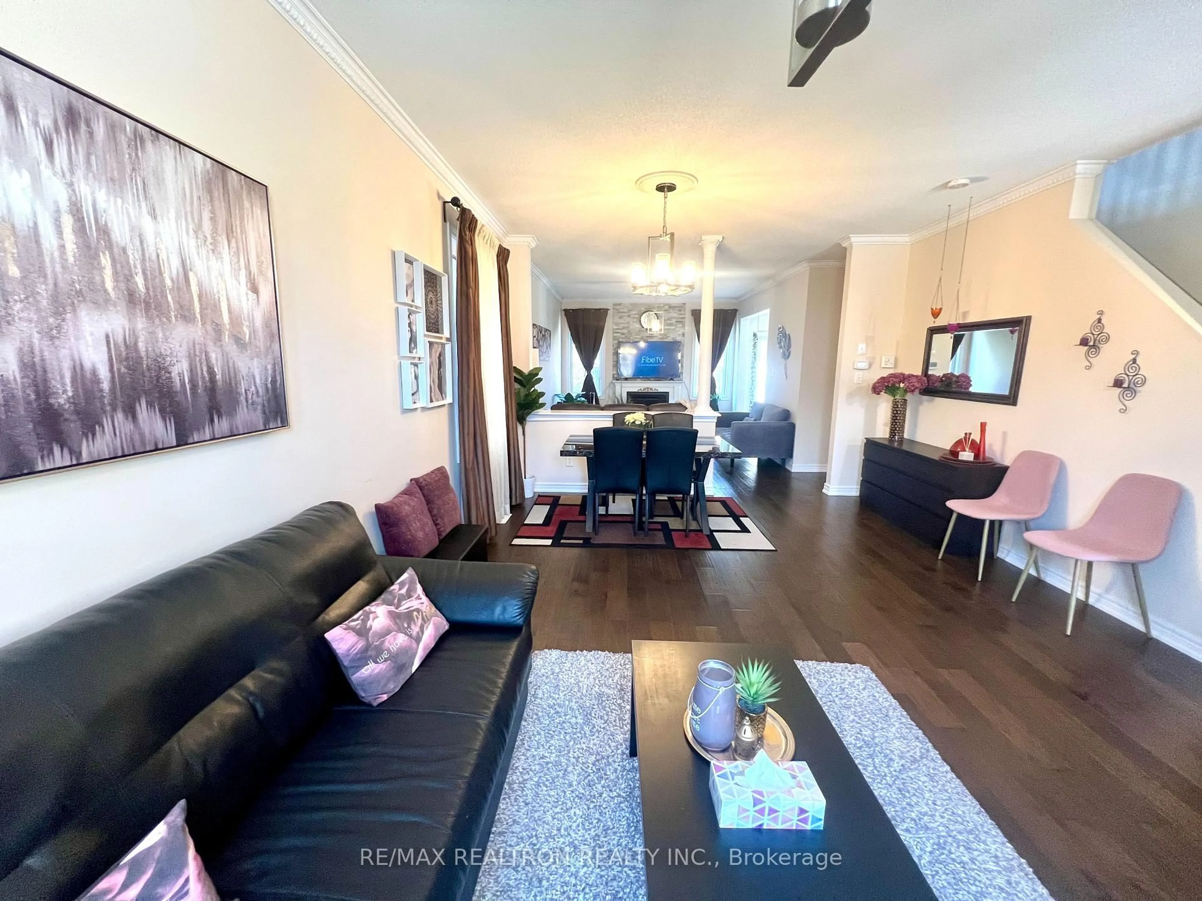 Living room with furniture, wood/laminate floor for 6 Mimosa St, Markham Ontario L6E 1E1