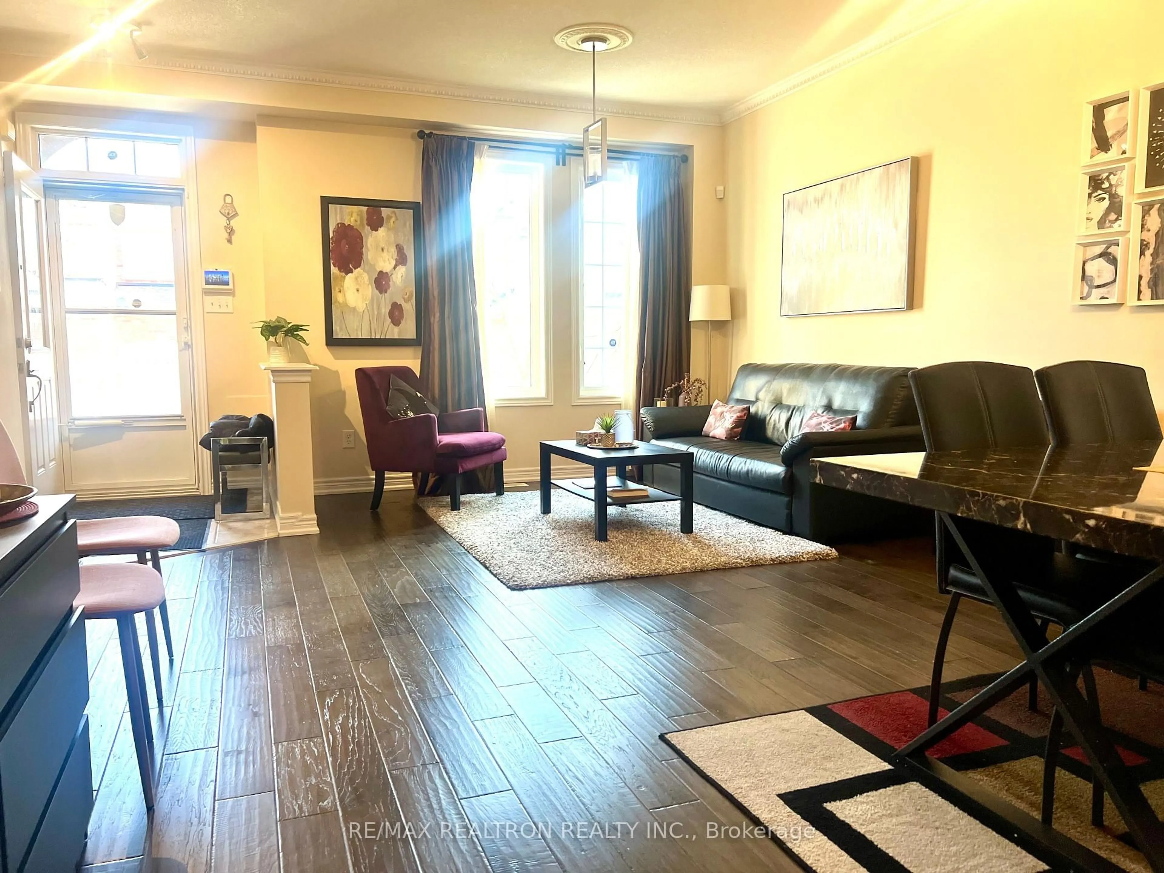 Living room with furniture, wood/laminate floor for 6 Mimosa St, Markham Ontario L6E 1E1