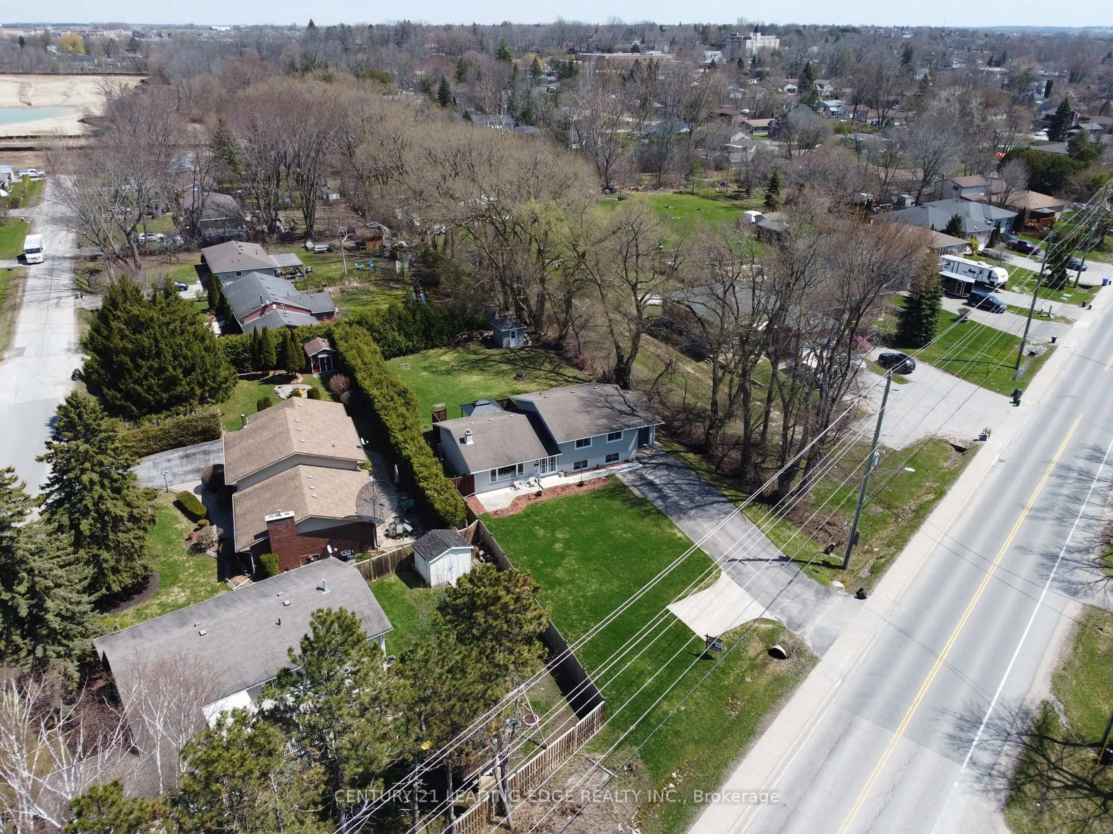 A pic from outside/outdoor area/front of a property/back of a property/a pic from drone, street for 53 Metro Rd, Georgina Ontario L4P 1C1