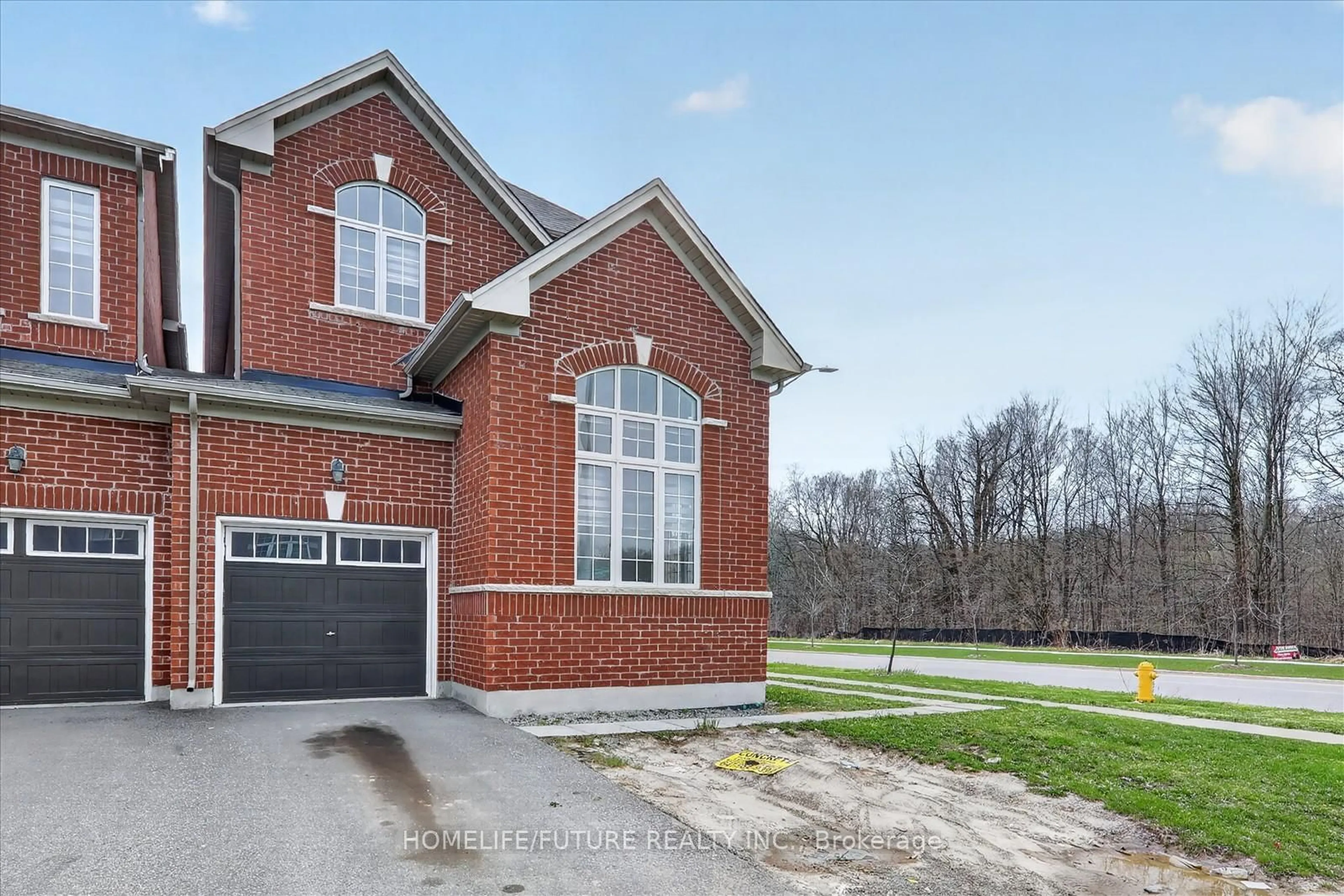 Home with brick exterior material, street for 1 Reddington Rd, Markham Ontario L3S 0E2