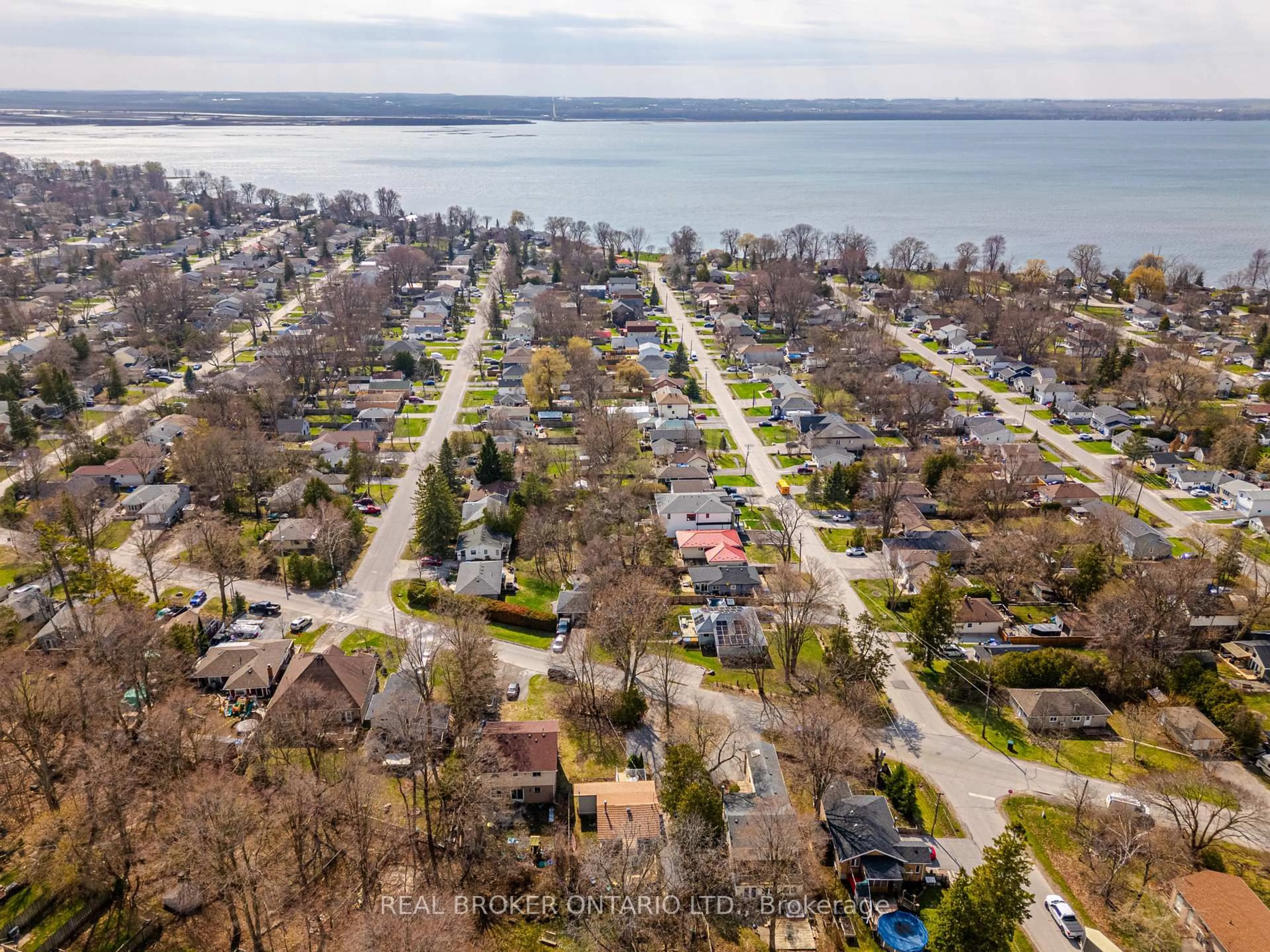 A pic from outside/outdoor area/front of a property/back of a property/a pic from drone, water/lake/river/ocean view for 37 Pineway Ave, Georgina Ontario L4P 1X7