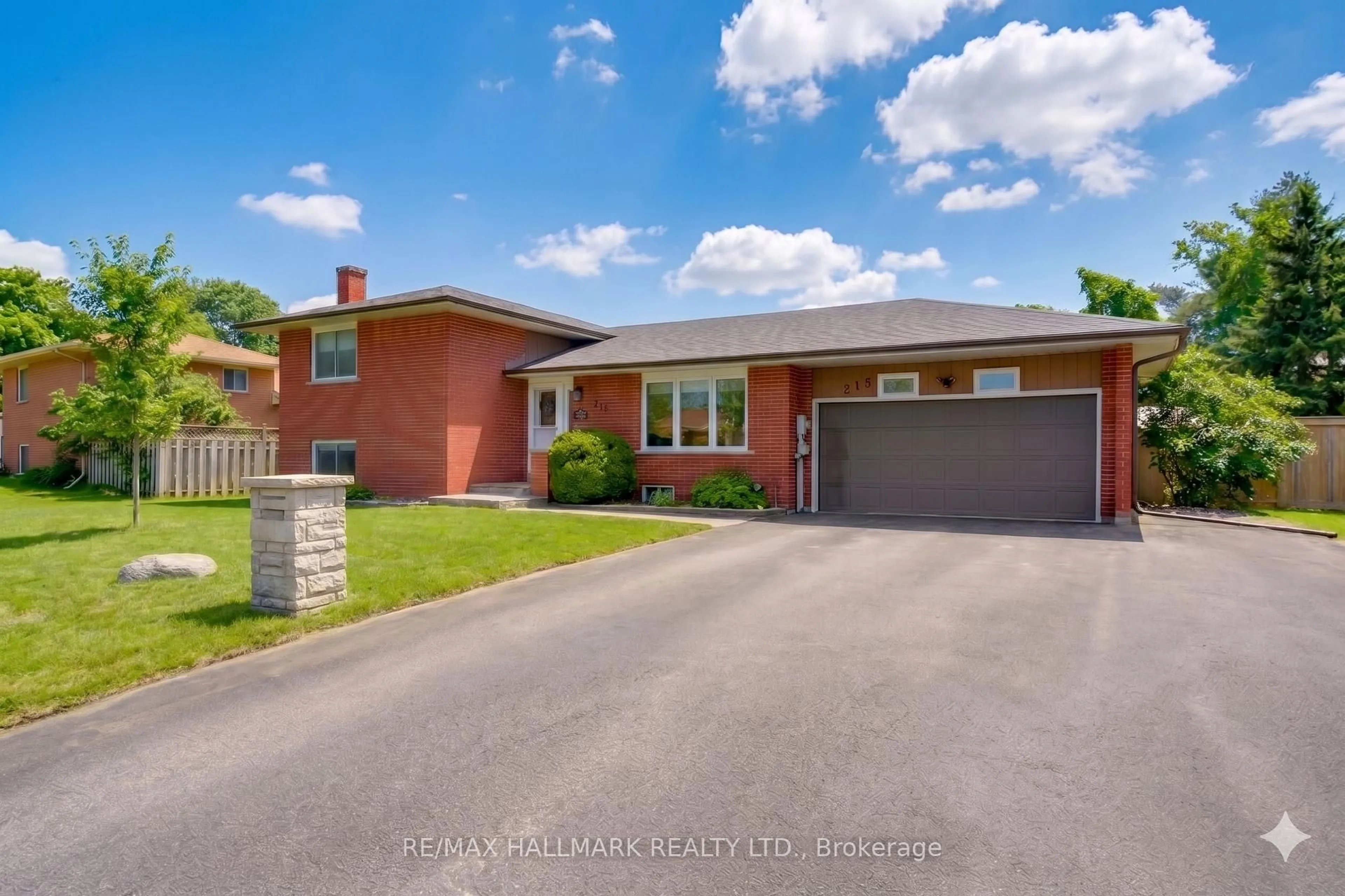 Home with brick exterior material, street for 215 Parkside Cres, Innisfil Ontario L9S 1G2