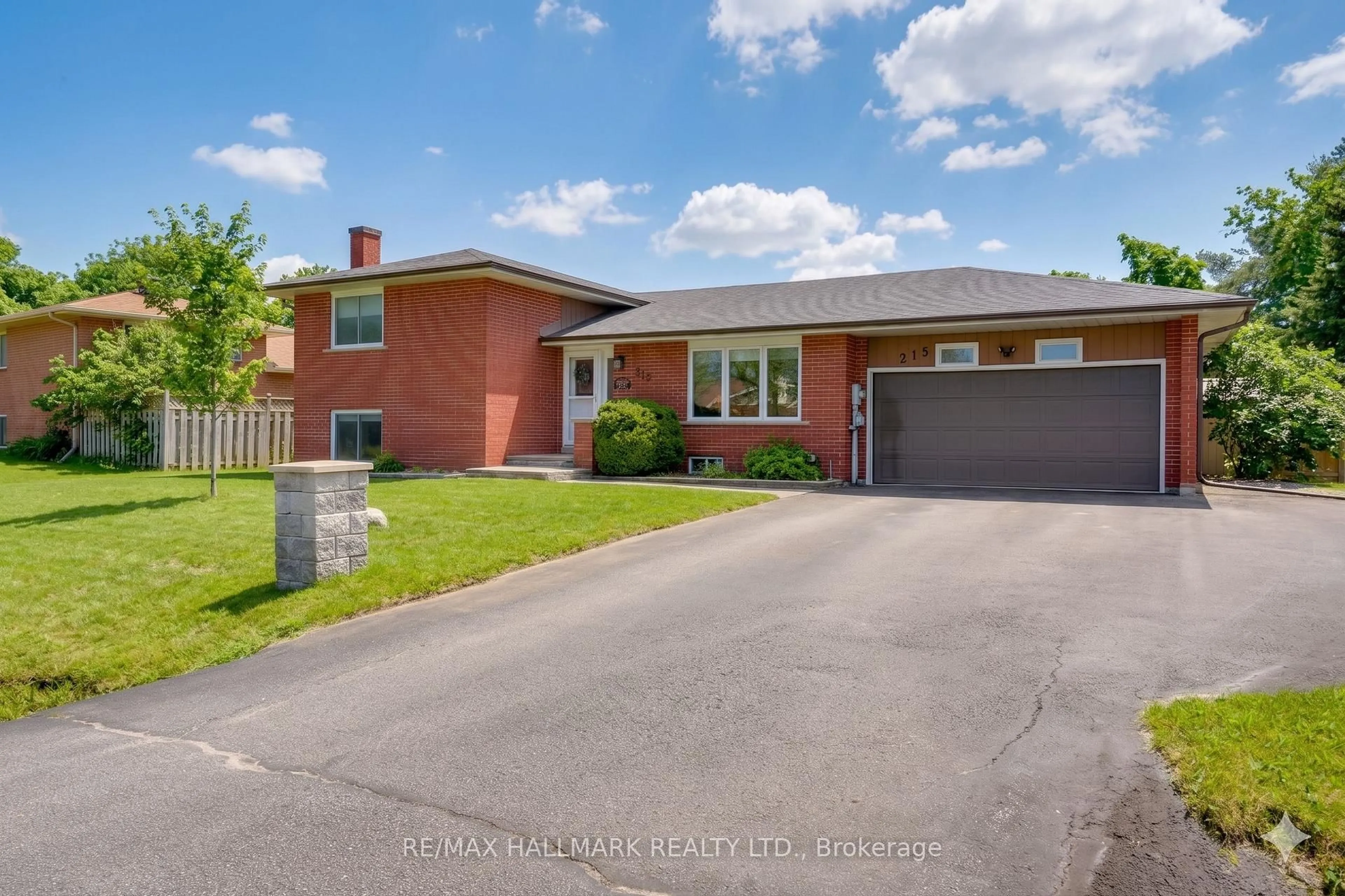 Home with brick exterior material, street for 215 Parkside Cres, Innisfil Ontario L9S 1G2