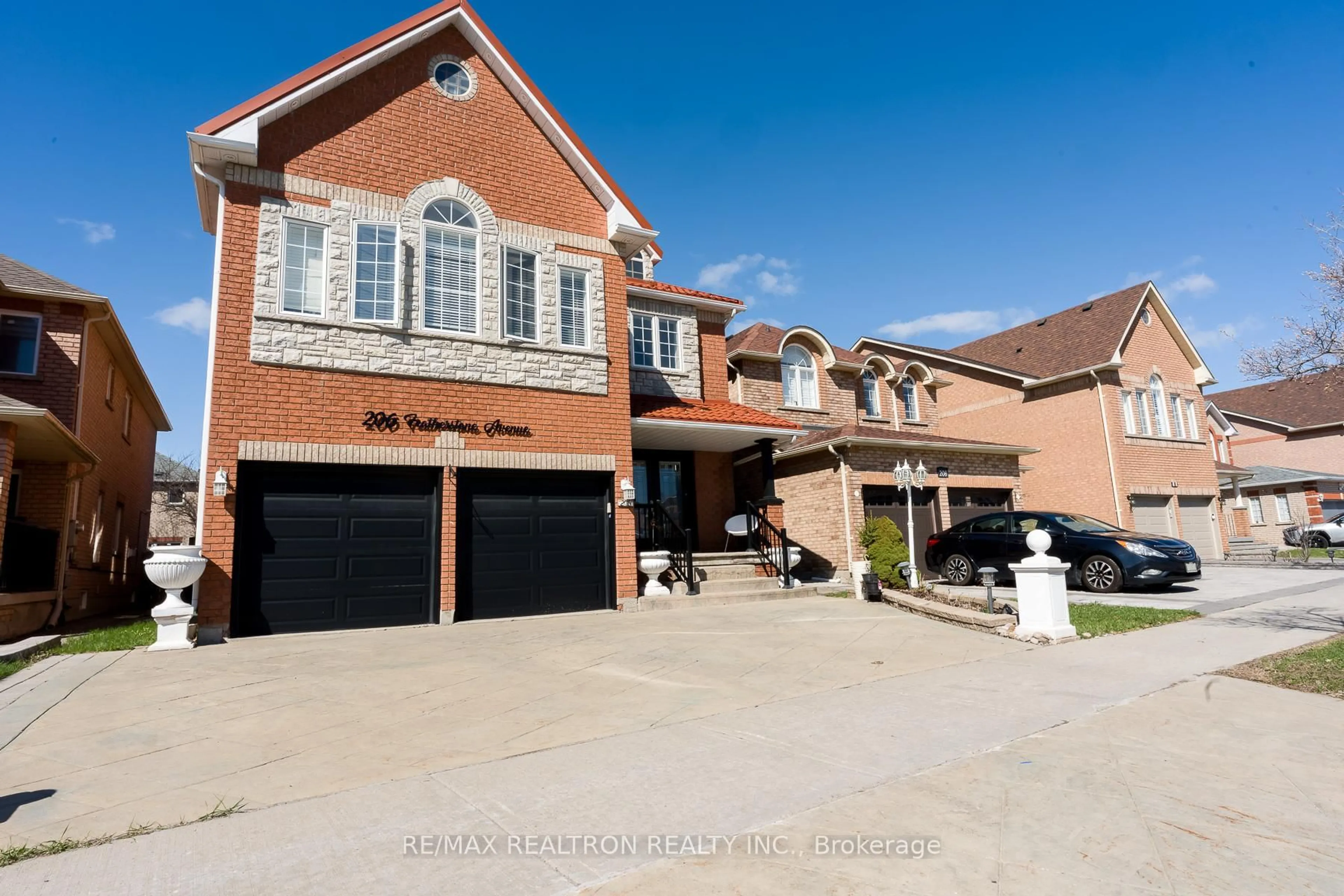 Home with brick exterior material, street for 206 Featherstone Ave, Markham Ontario L3S 4J1
