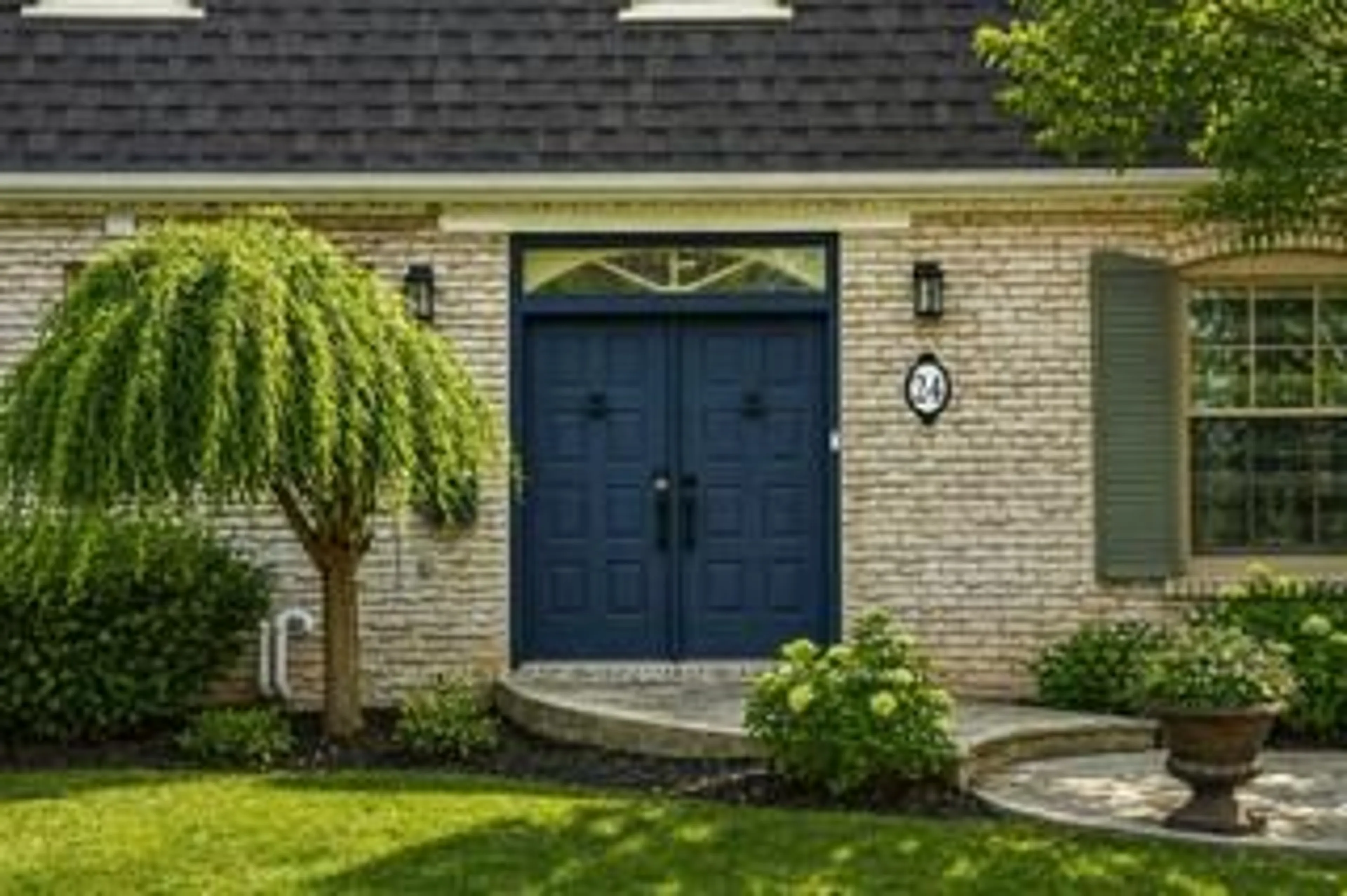 Home with brick exterior material, street for 24 Laureleaf Rd, Markham Ontario L3T 2X5
