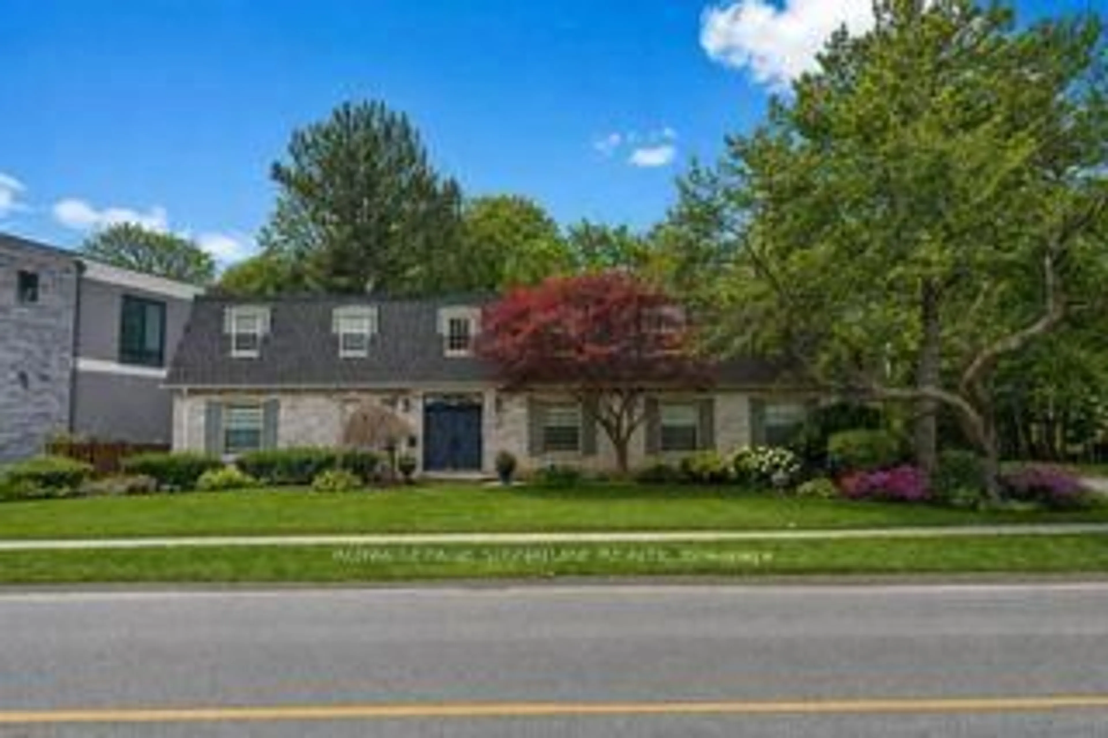 Home with brick exterior material, street for 24 Laureleaf Rd, Markham Ontario L3T 2X5