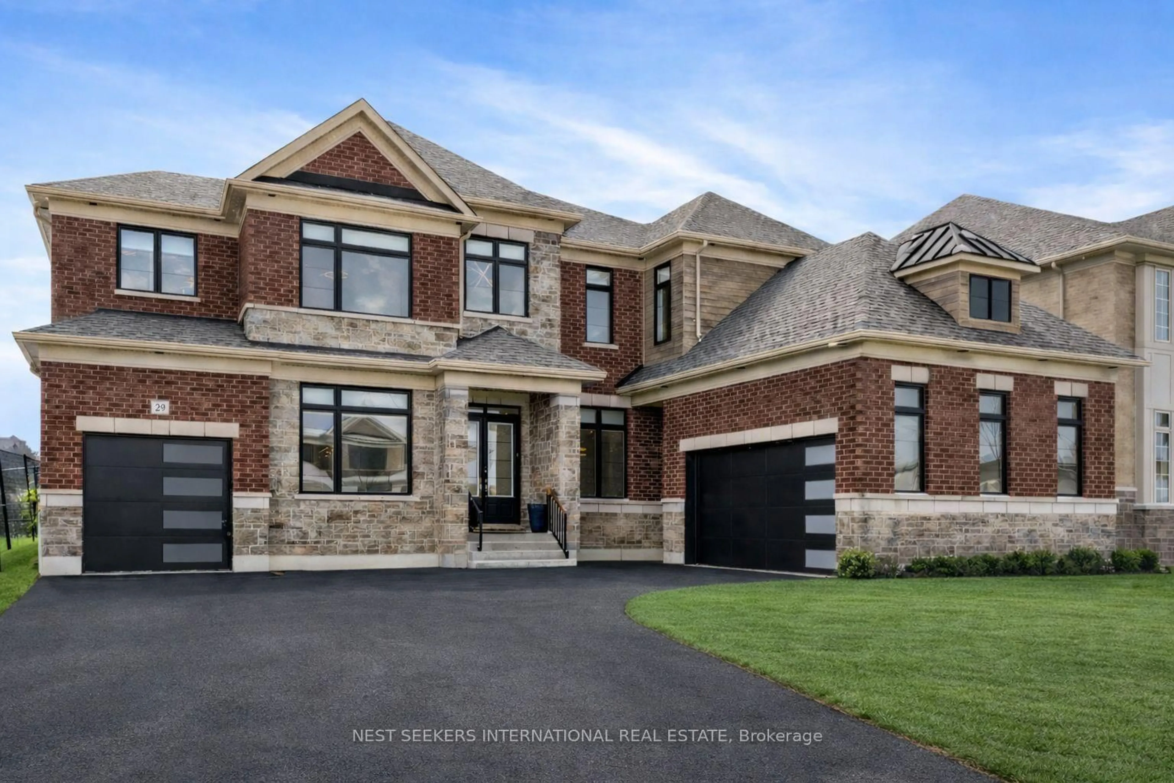 Home with brick exterior material, street for 29 Marigold Blvd, Adjala-Tosorontio Ontario L0G 1W0