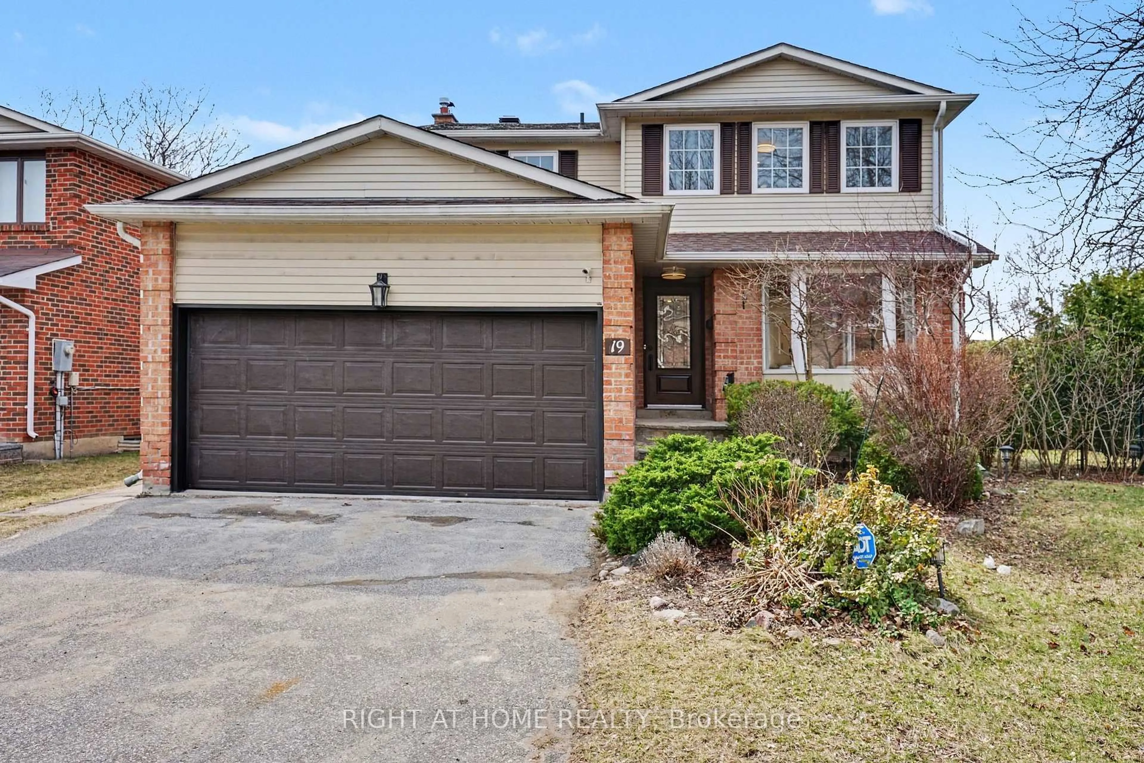 Home with brick exterior material, street for 19 LANG Rd, Markham Ontario L3T 7E8