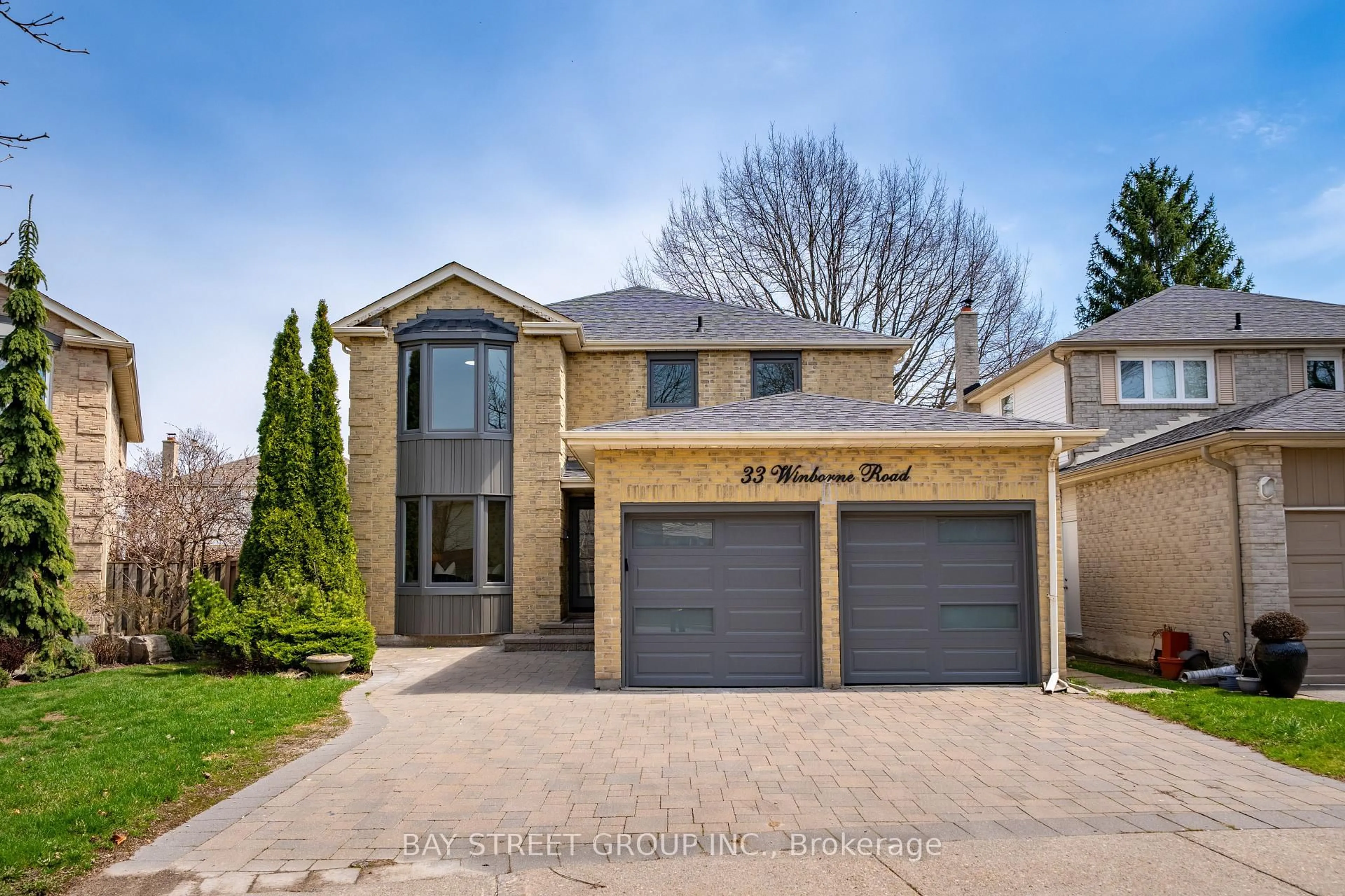 Home with brick exterior material, street for 33 Winborne Dr, Vaughan Ontario L4J 2R8