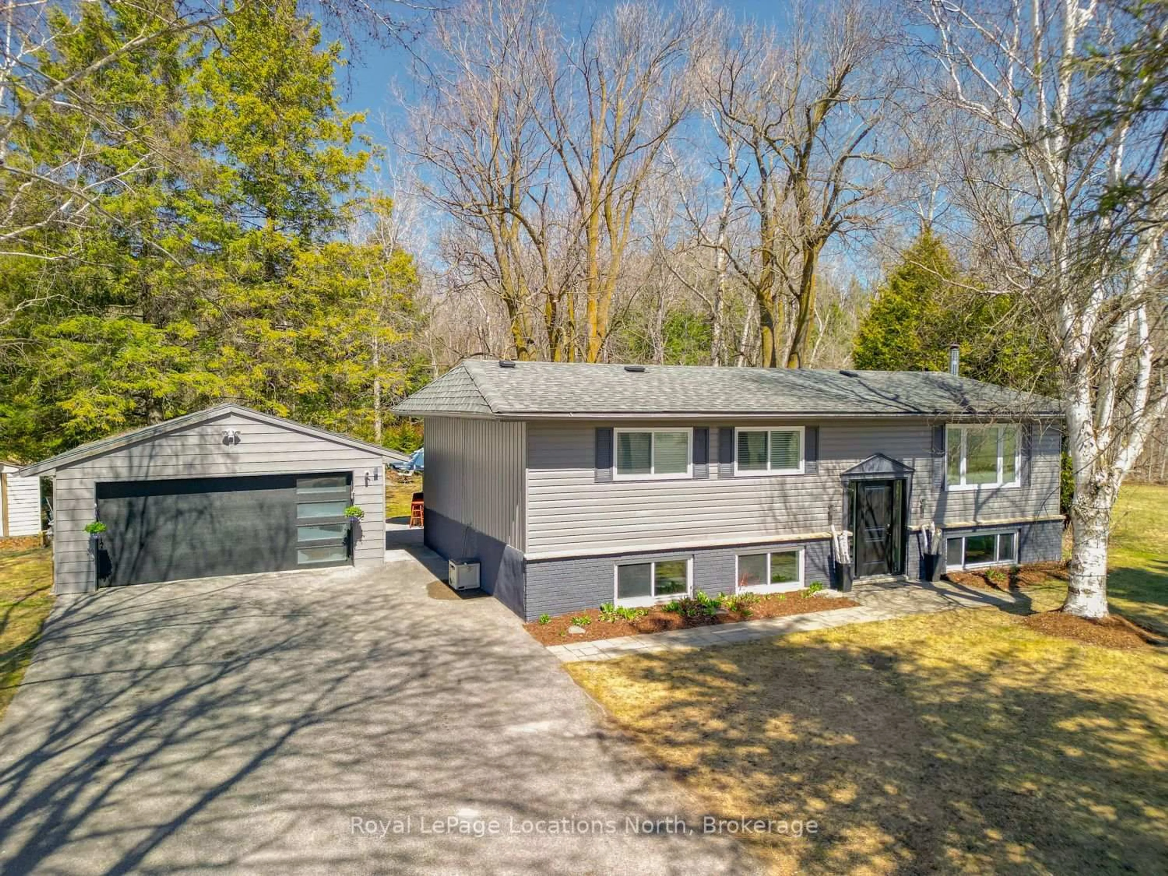 A pic from outside/outdoor area/front of a property/back of a property/a pic from drone, street for 5392 13th Line, New Tecumseth Ontario L0L 1L0