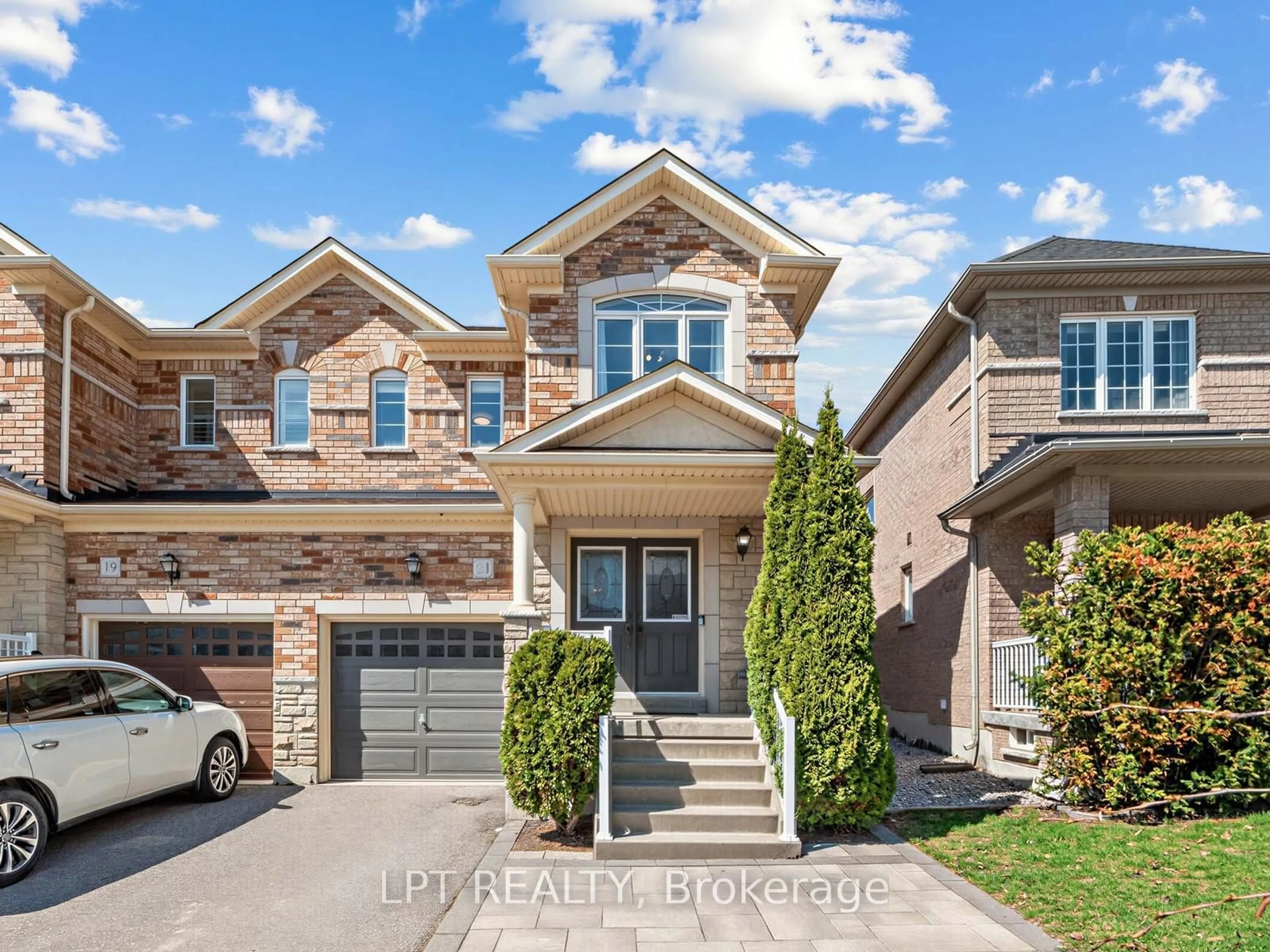 Home with brick exterior material, street for 21 Amos Lehman Way, Whitchurch-Stouffville Ontario L4A 0J9