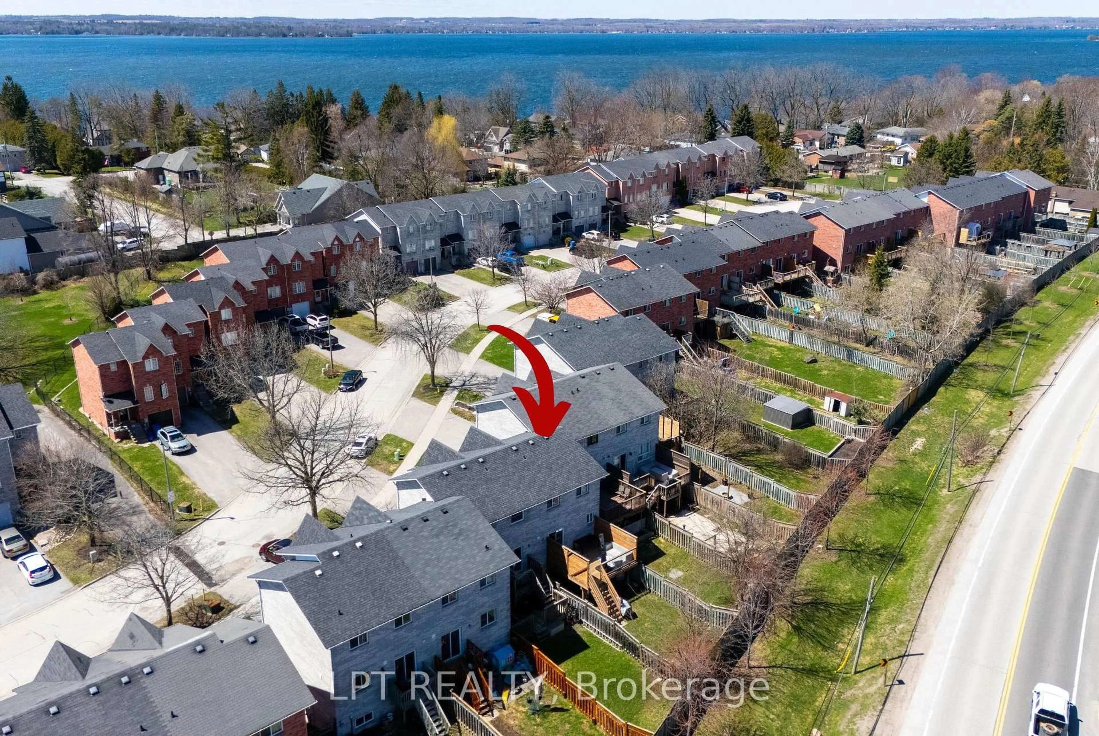 A pic from outside/outdoor area/front of a property/back of a property/a pic from drone, water/lake/river/ocean view for 25 Hattie Crt, Georgina Ontario L4P 3Z7