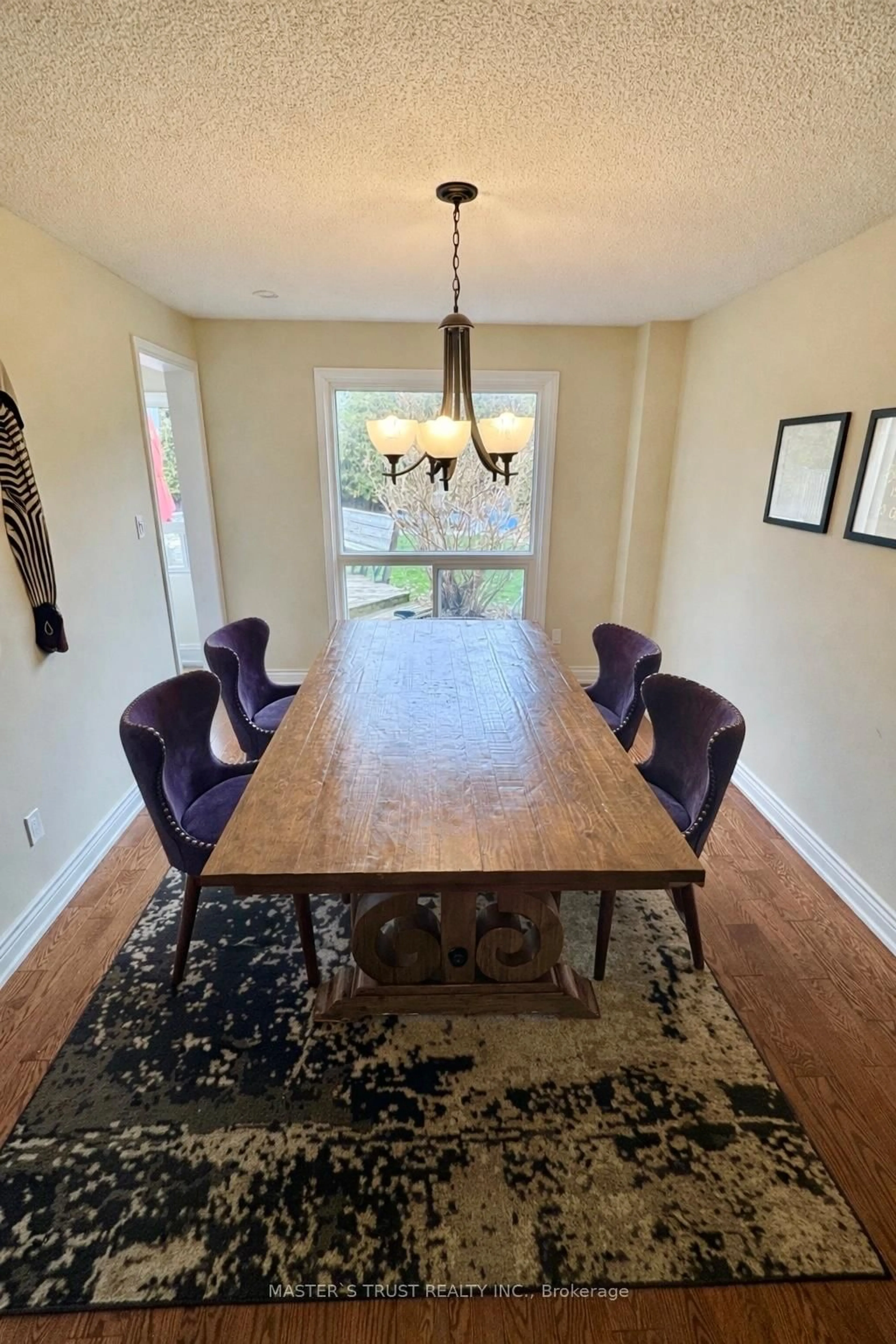 Dining room, wood/laminate floor for 112 Krieghoff Ave, Markham Ontario L3R 1V9