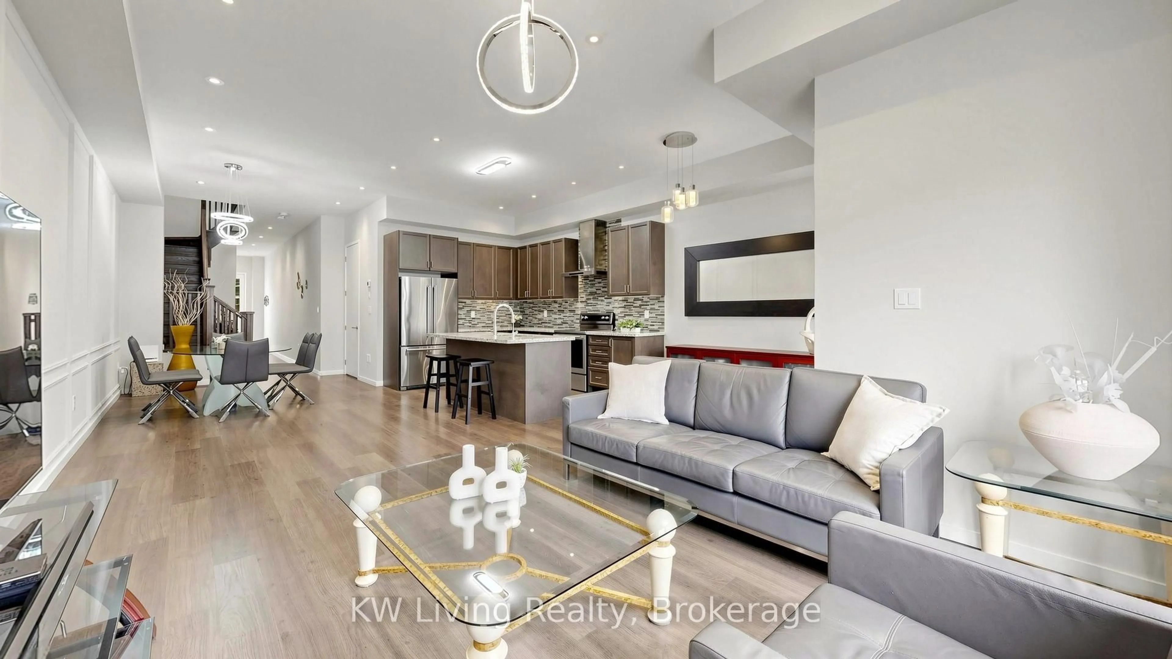 Open concept kitchen, wood/laminate floor for 389 Elyse Crt, Aurora Ontario L4G 2C9