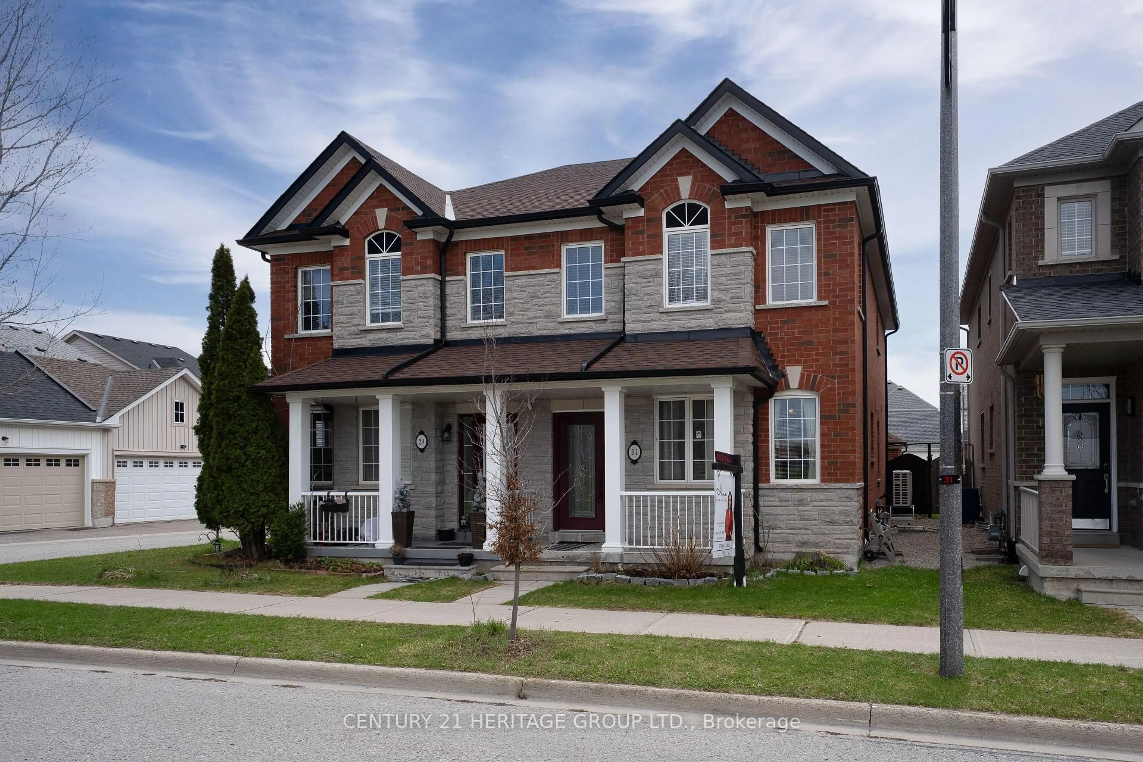 Home with brick exterior material, street for 31 Kalvinster Dr, Markham Ontario L6B 0A7