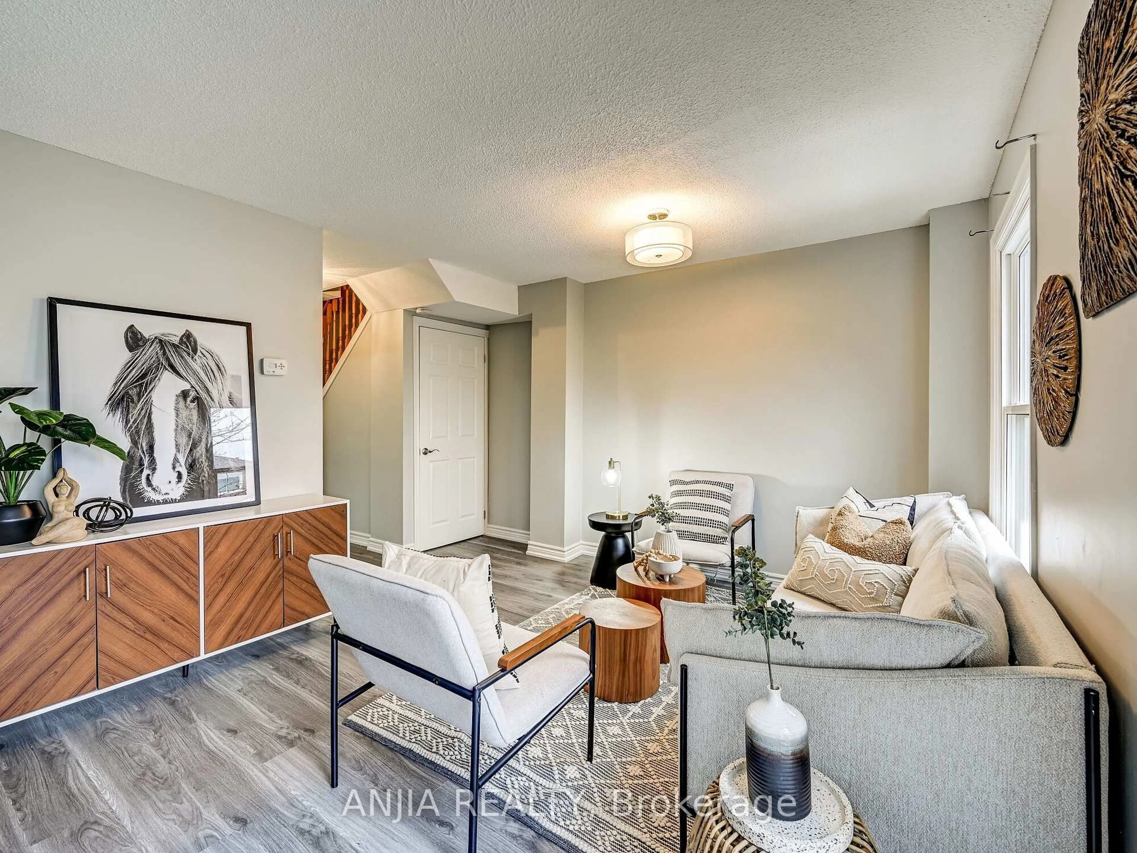 Living room with furniture, unknown for 61 Sorrell Cres, Markham Ontario L3S 1K9