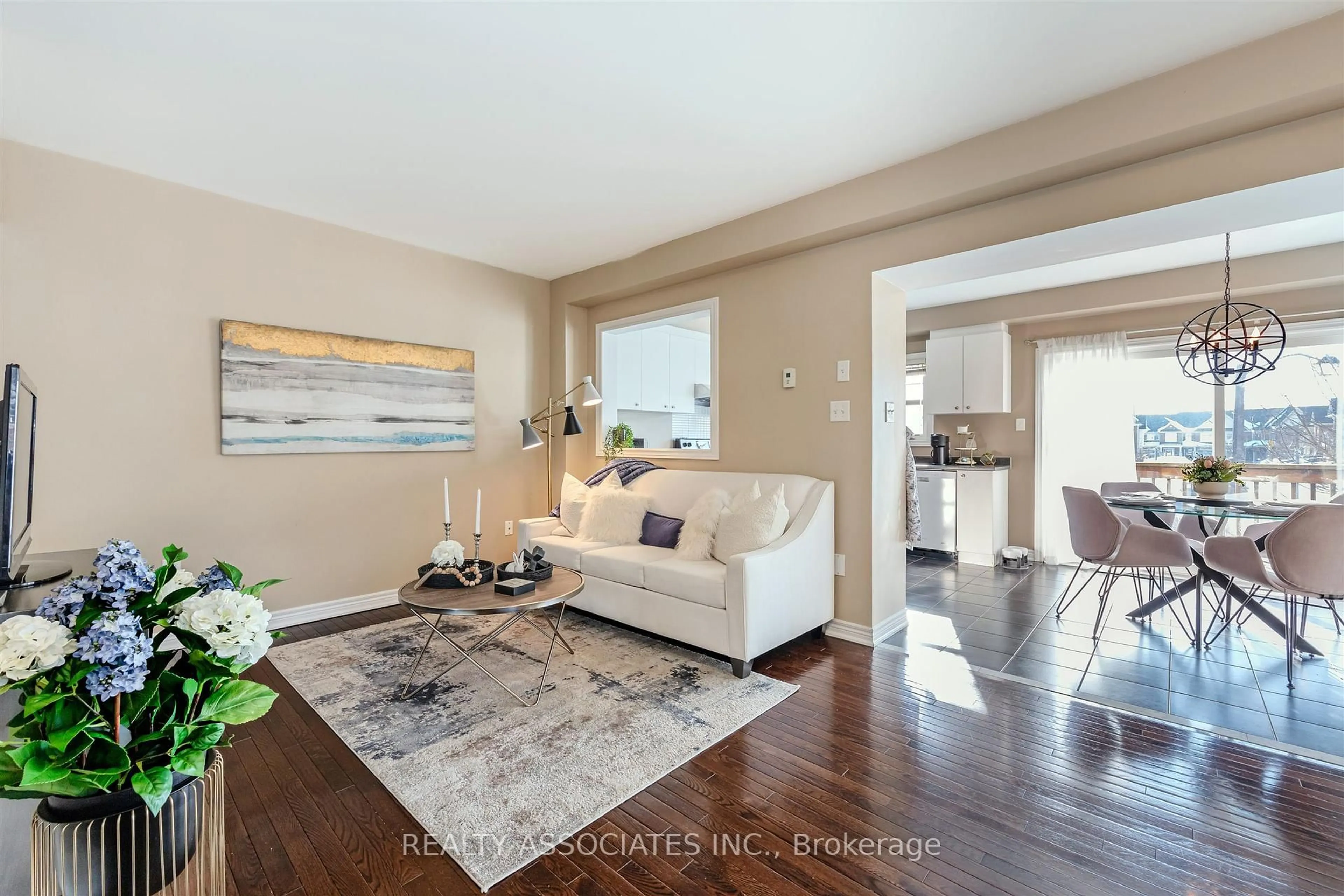 Living room with furniture, wood/laminate floor for 19 Bearings Ave, Whitchurch-Stouffville Ontario L4A 0W6