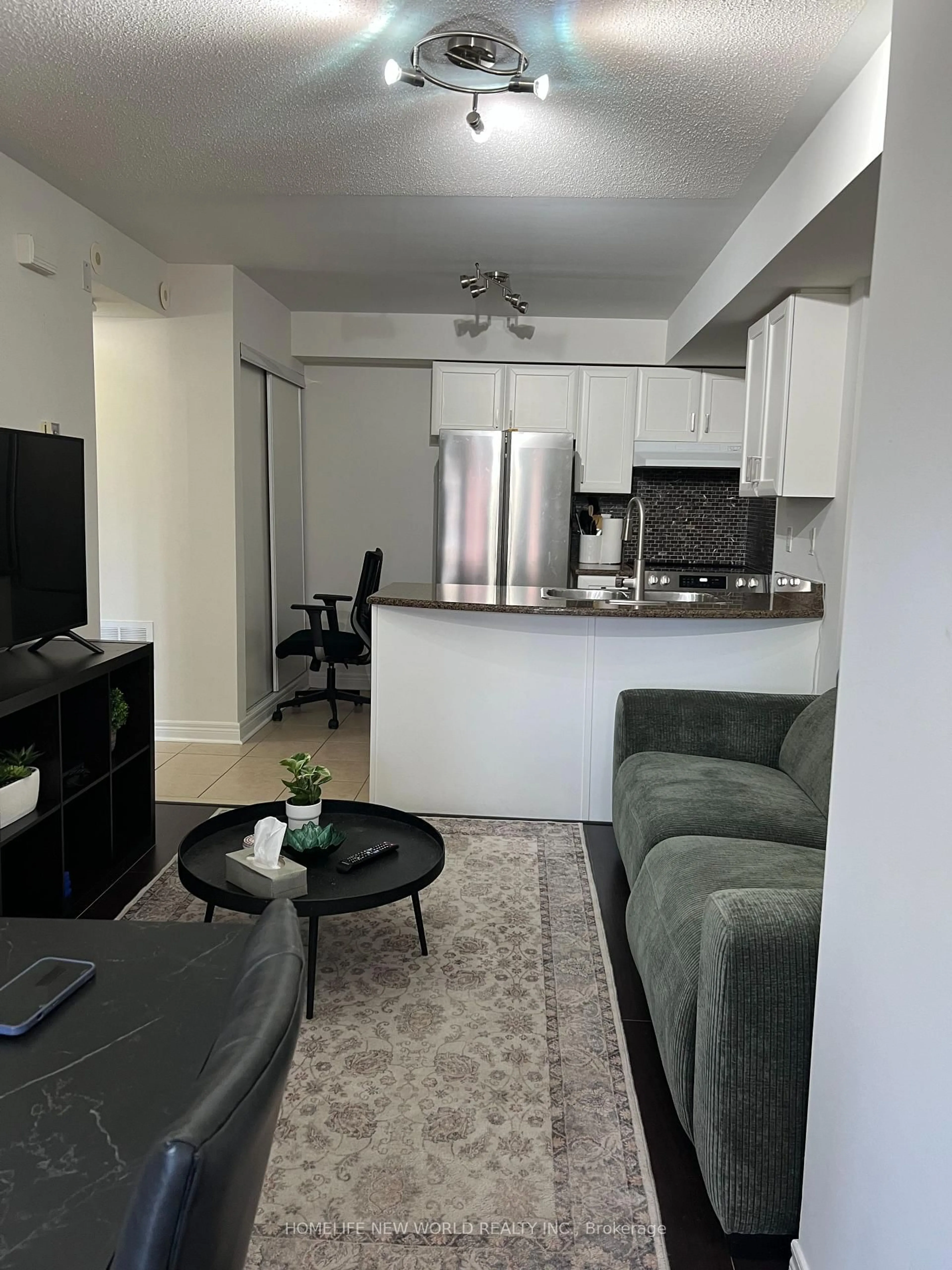 Living room with furniture, unknown for 306 John St #292, Markham Ontario L3T 0A7