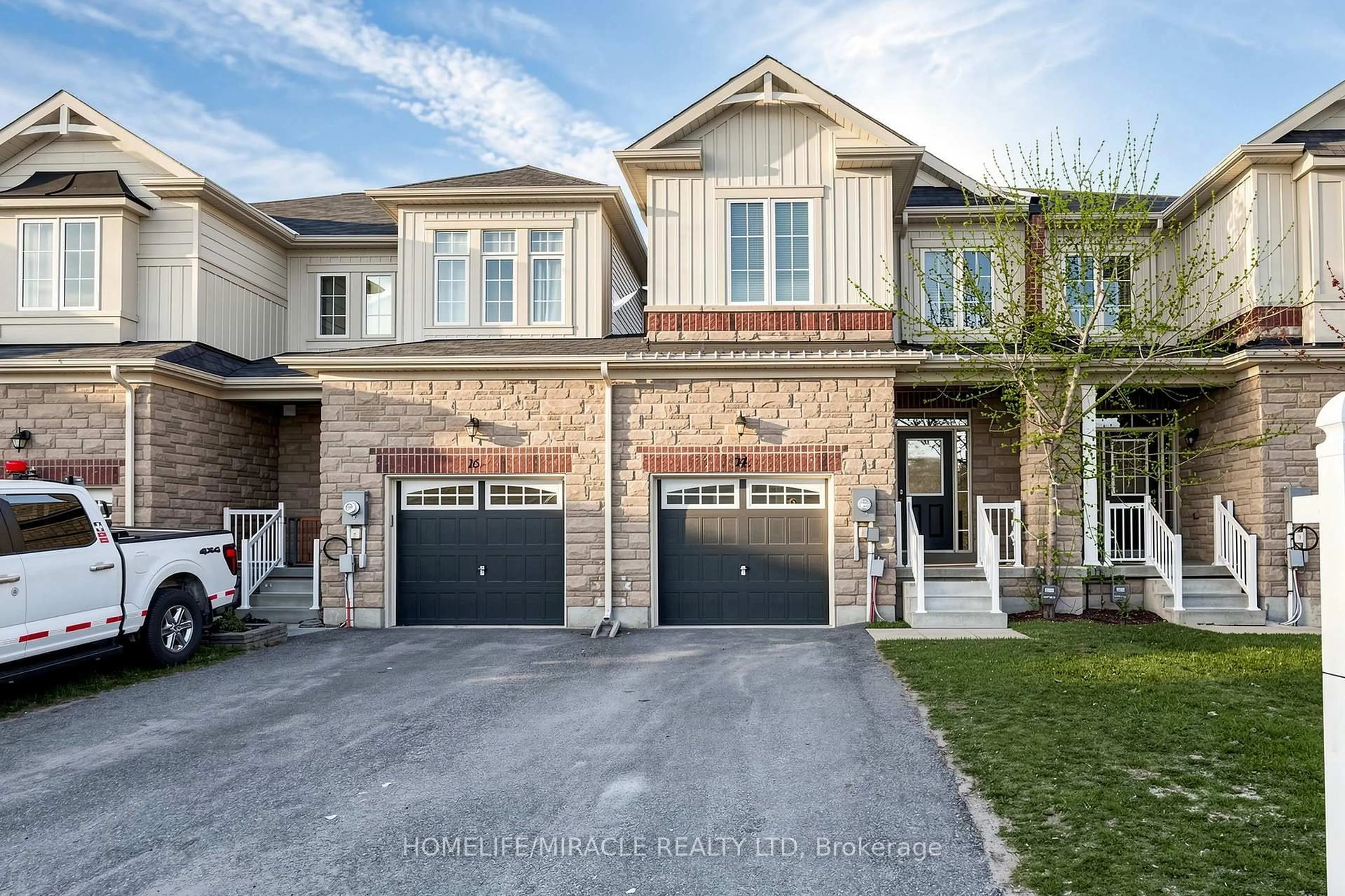 Home with brick exterior material, street for 14 Greenwood Dr, Essa Ontario L3W 0N5