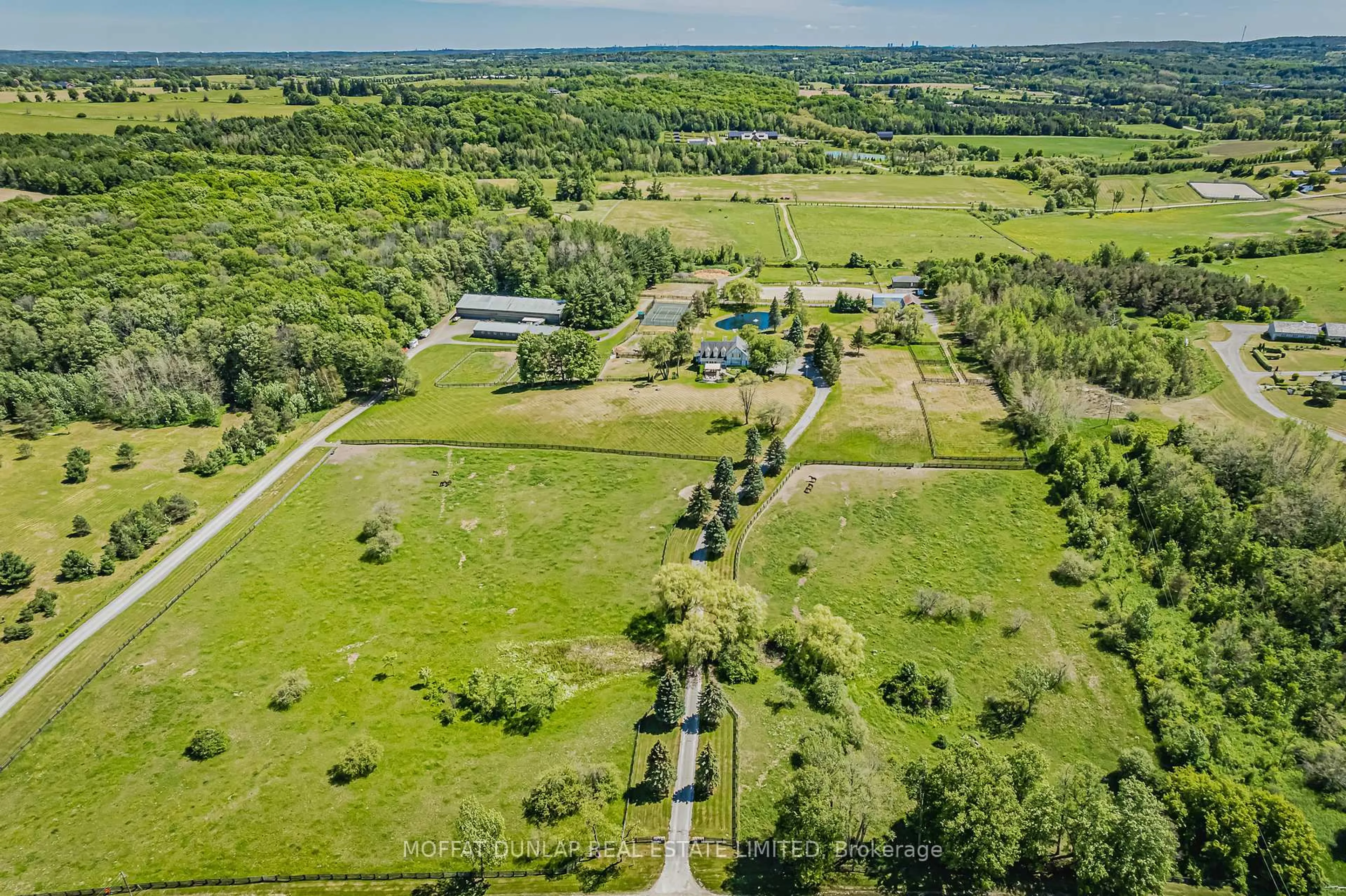 A pic from outside/outdoor area/front of a property/back of a property/a pic from drone, unknown for 2105-2065 19th Sdrd, King Ontario L0G 1K0
